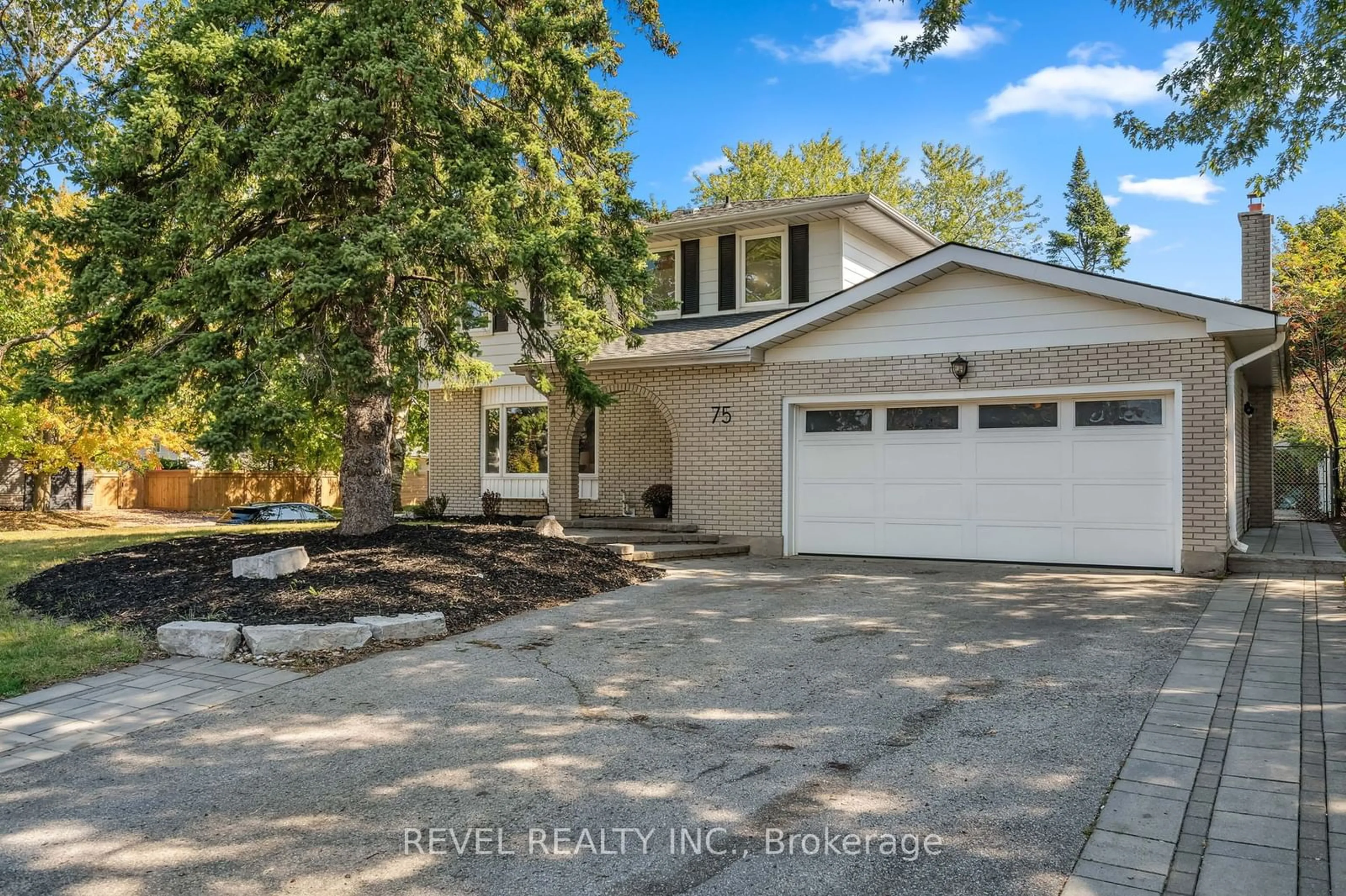 Frontside or backside of a home, the fenced backyard for 75 Marshall St, Barrie Ontario L4N 3S9