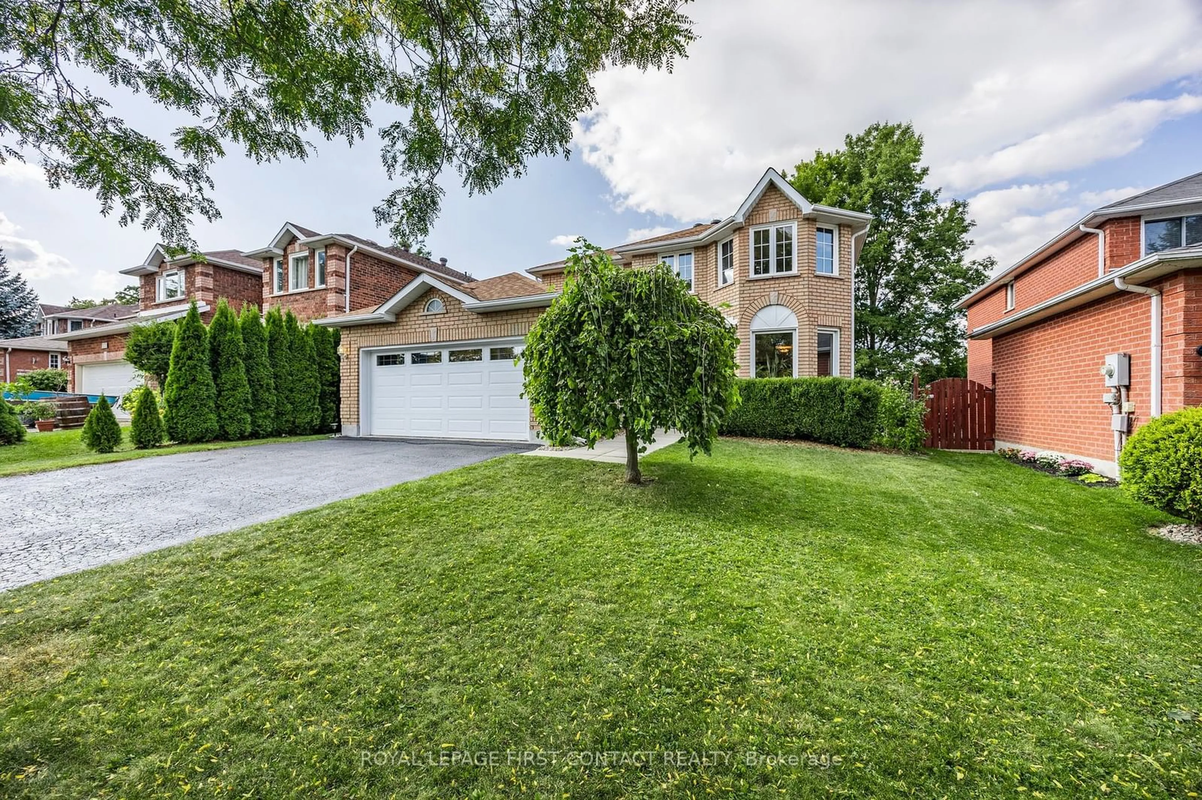 Frontside or backside of a home, the fenced backyard for 298 Livingstone St, Barrie Ontario L4N 7C2