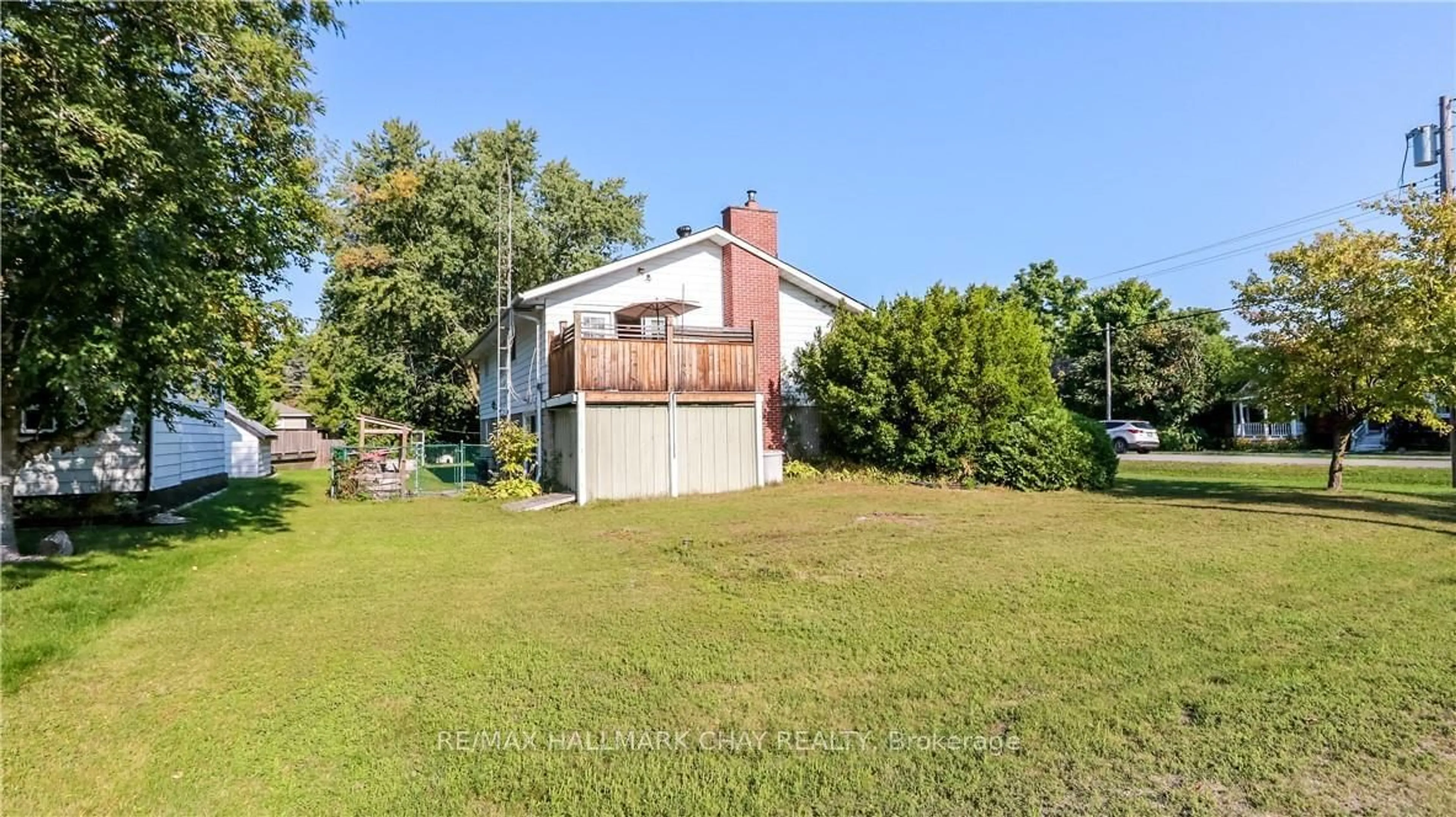 Frontside or backside of a home, the fenced backyard for 250 Superior St, Clearview Ontario L0M 1S0