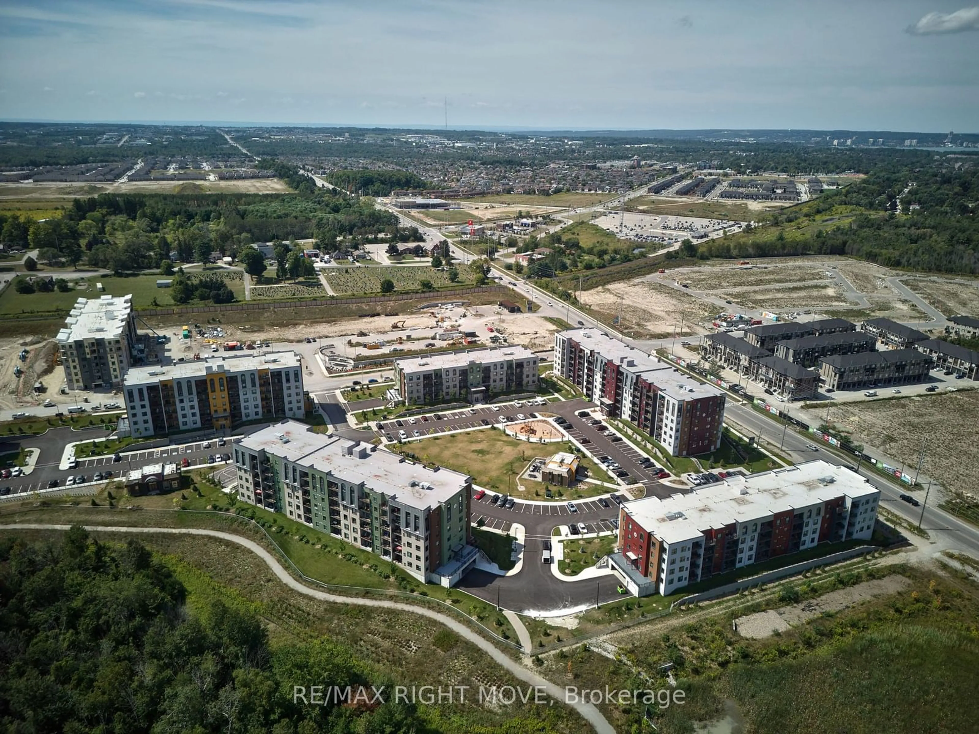 A pic from exterior of the house or condo, the view of city buildings for 5 Chef Lane #410, Barrie Ontario L9J 0J8