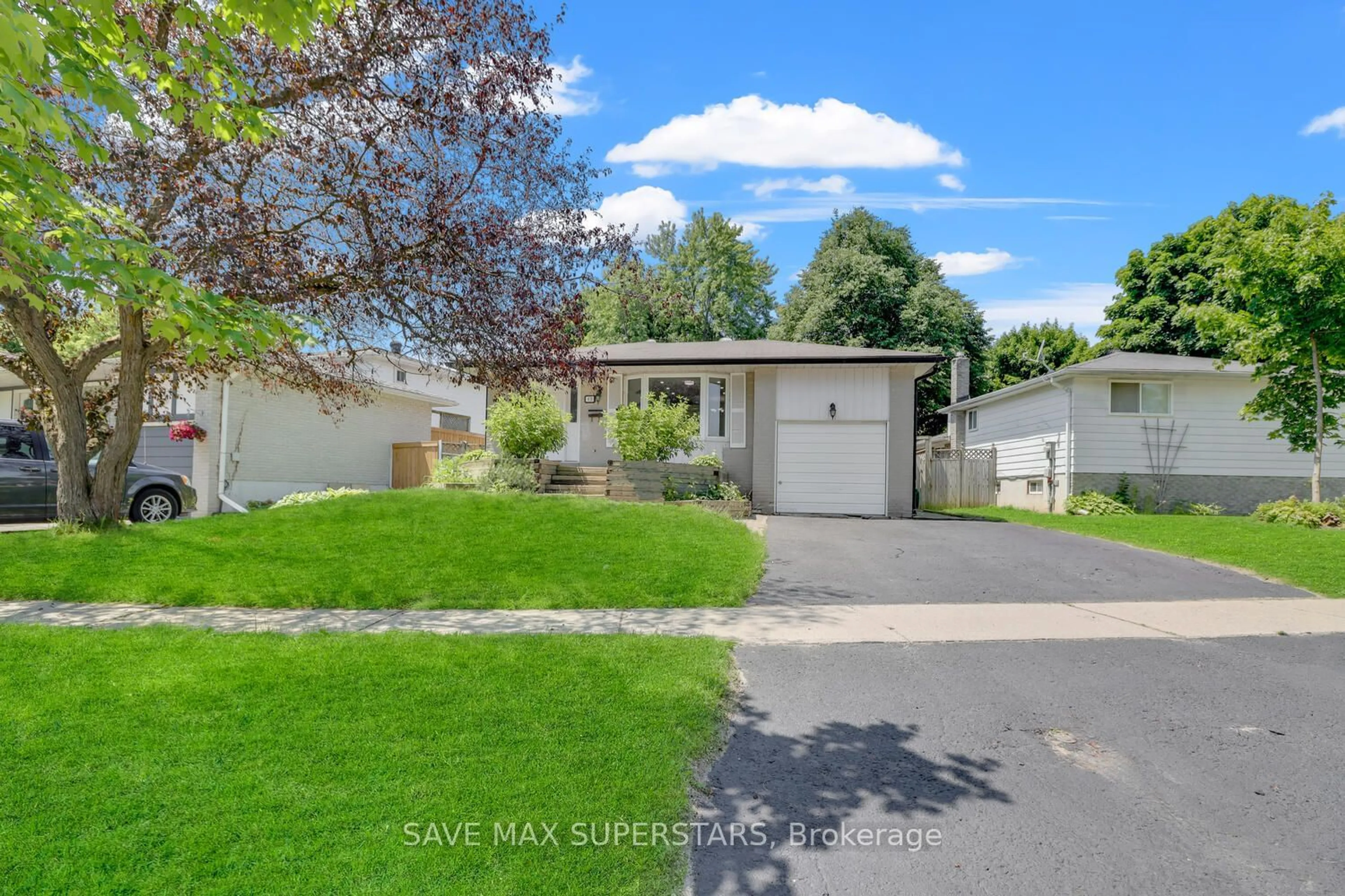 Frontside or backside of a home, the fenced backyard for 41 College Cres, Barrie Ontario L4M 2W4