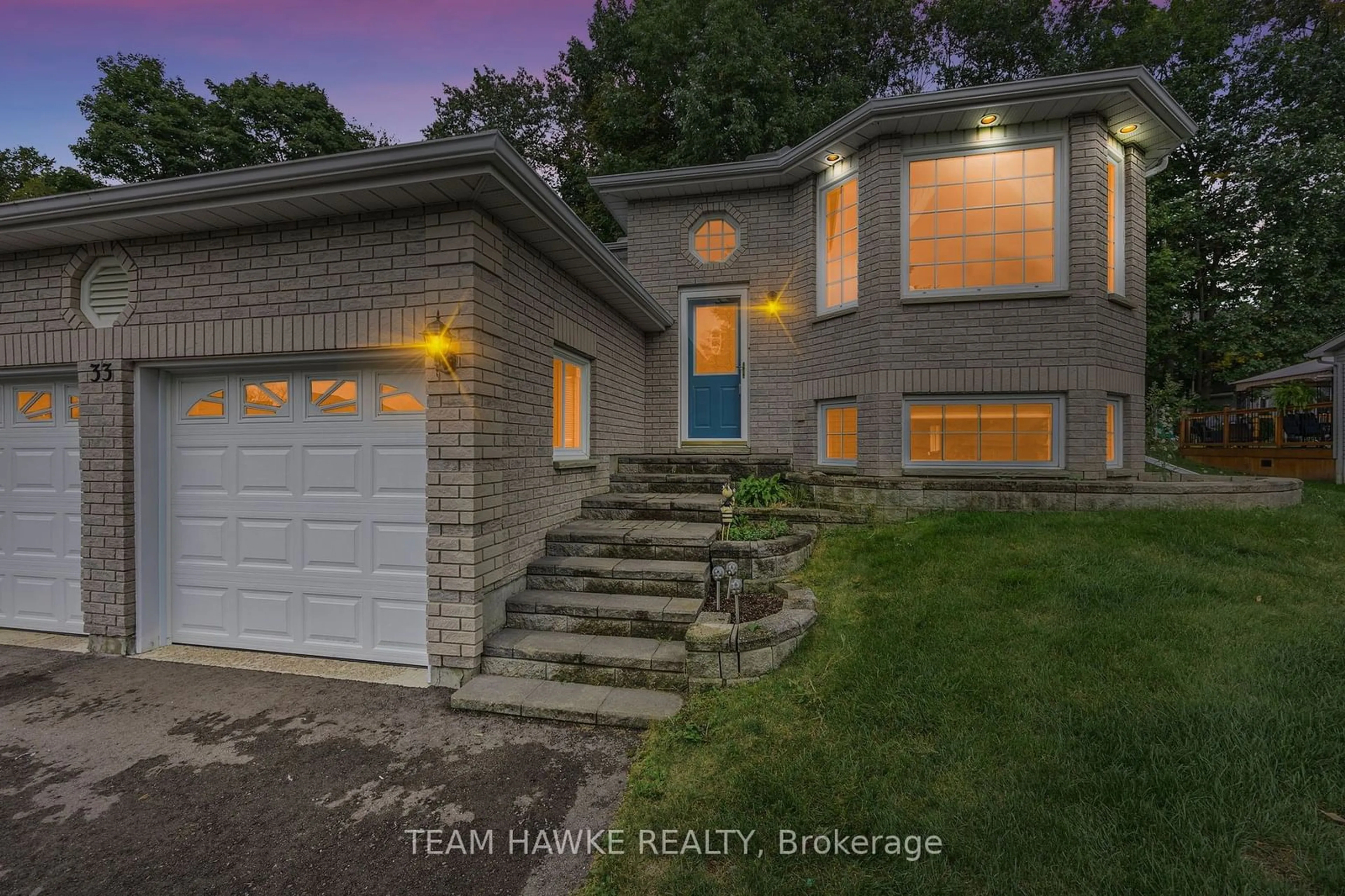 Frontside or backside of a home, the street view for 33 Mcdermitt Tr, Tay Ontario L0K 2A0