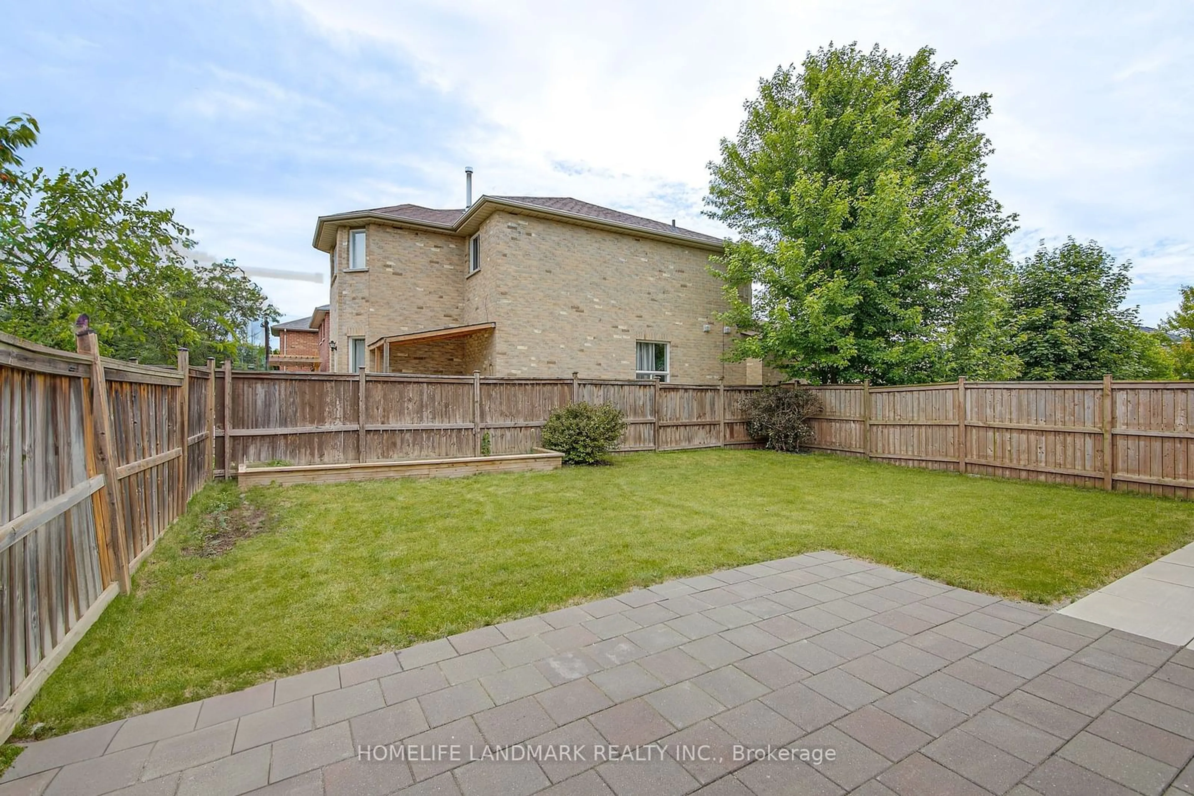 Frontside or backside of a home, the fenced backyard for 65 Wismer Ave, Barrie Ontario L4N 9T9