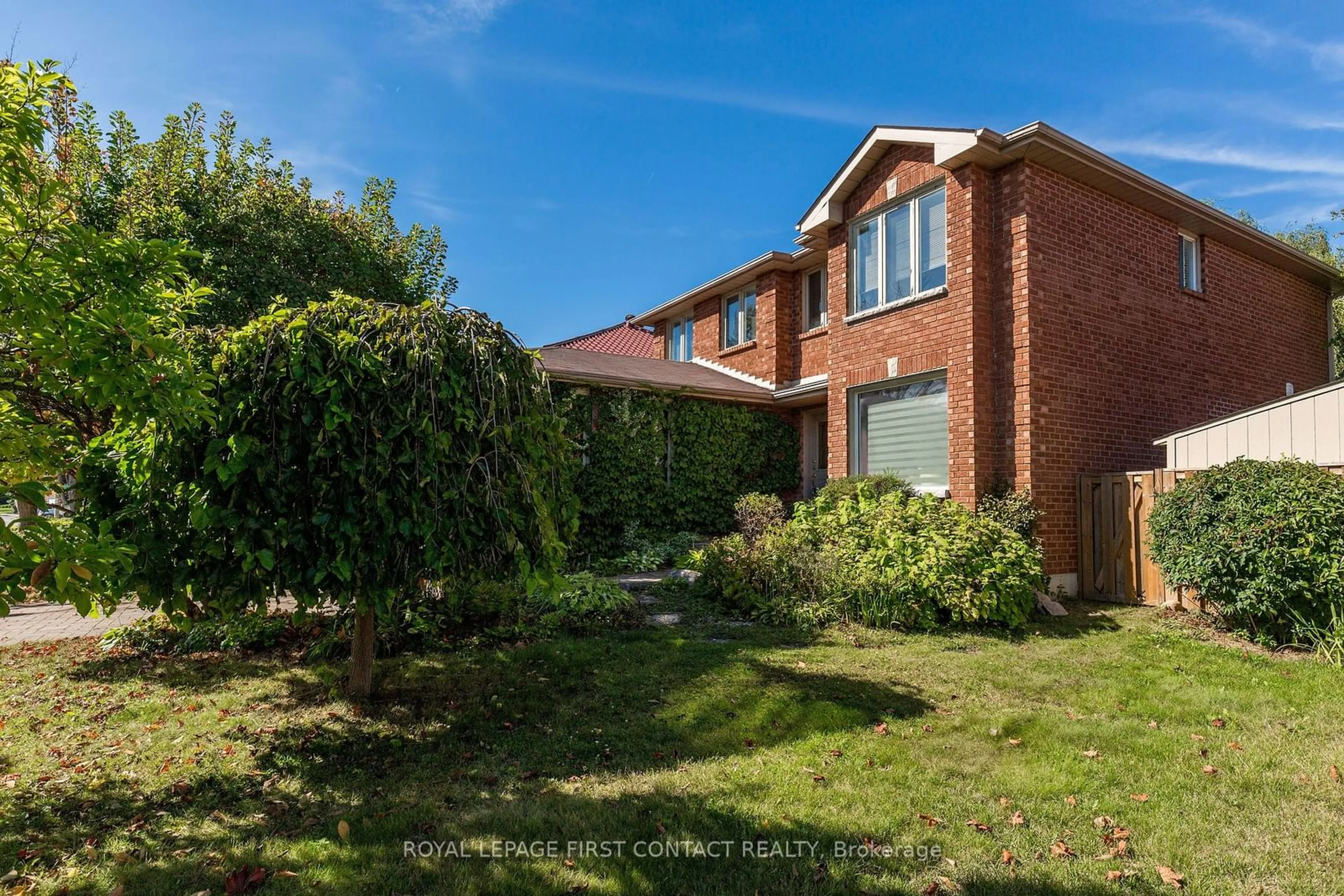 Frontside or backside of a home, the fenced backyard for 224 Livingstone St, Barrie Ontario L4N 6Z9