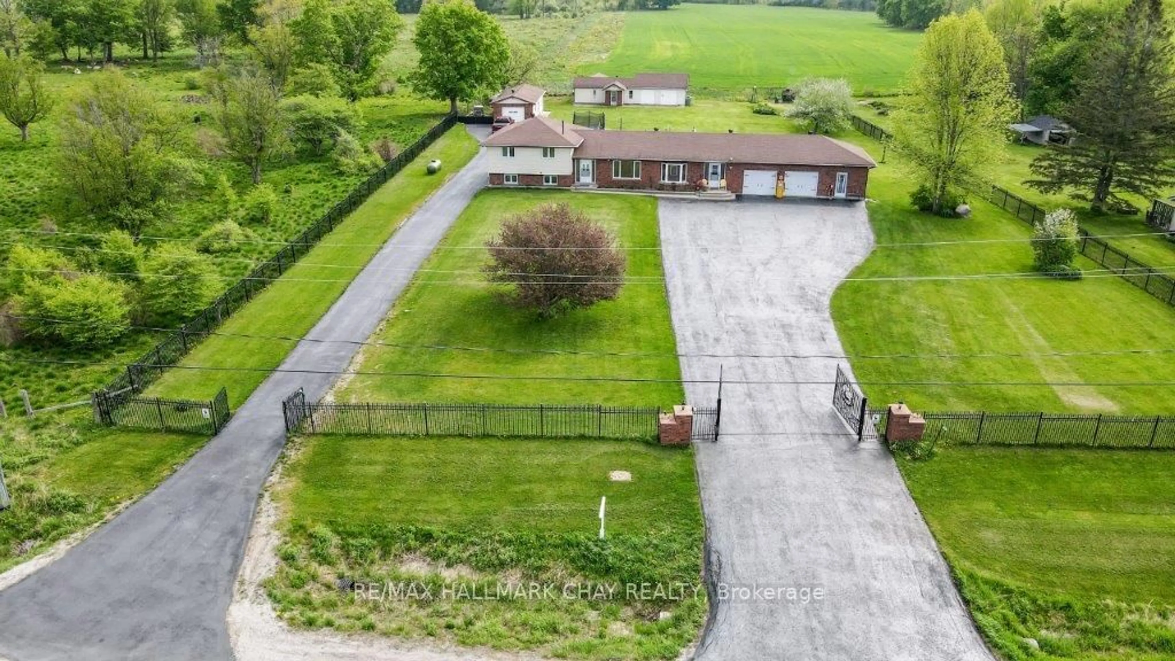 Frontside or backside of a home, the fenced backyard for 6689 Rama Rd, Ramara Ontario L0K 1L0