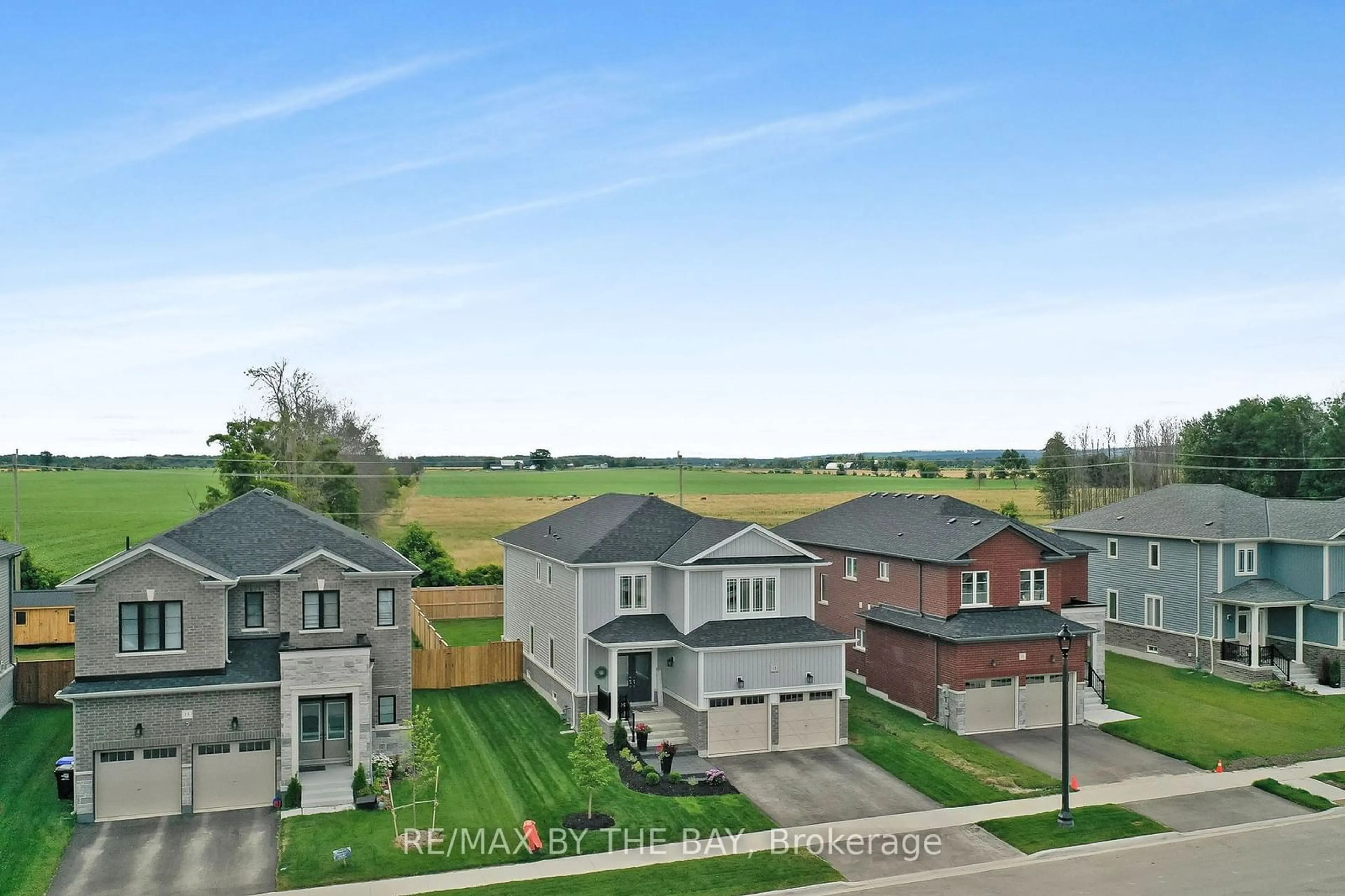 Frontside or backside of a home, the street view for 13 Autumn Dr, Wasaga Beach Ontario L9Z 0K7