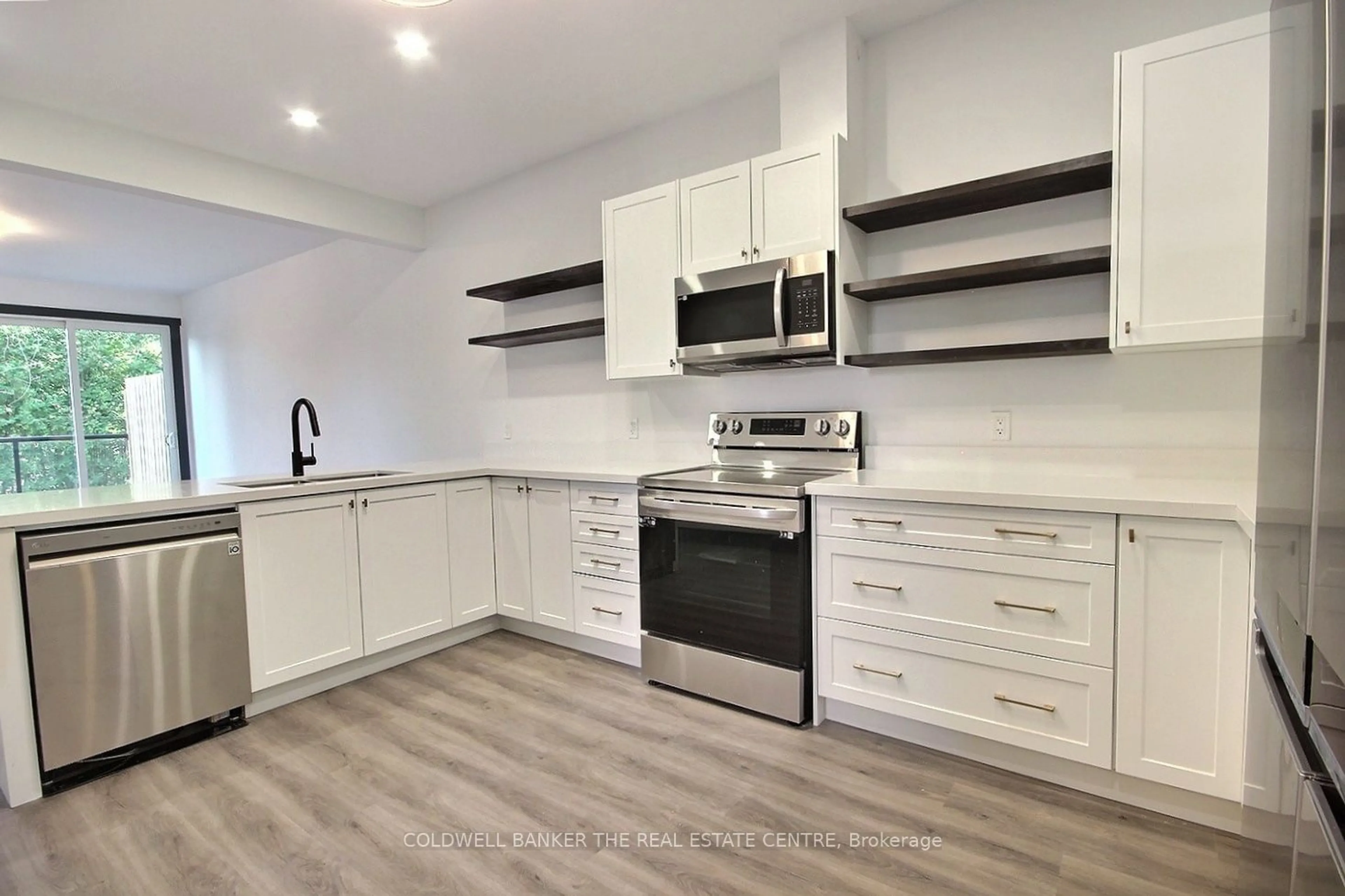 Open concept kitchen for 23 Gray St #B, Severn Ontario L0K 1E0