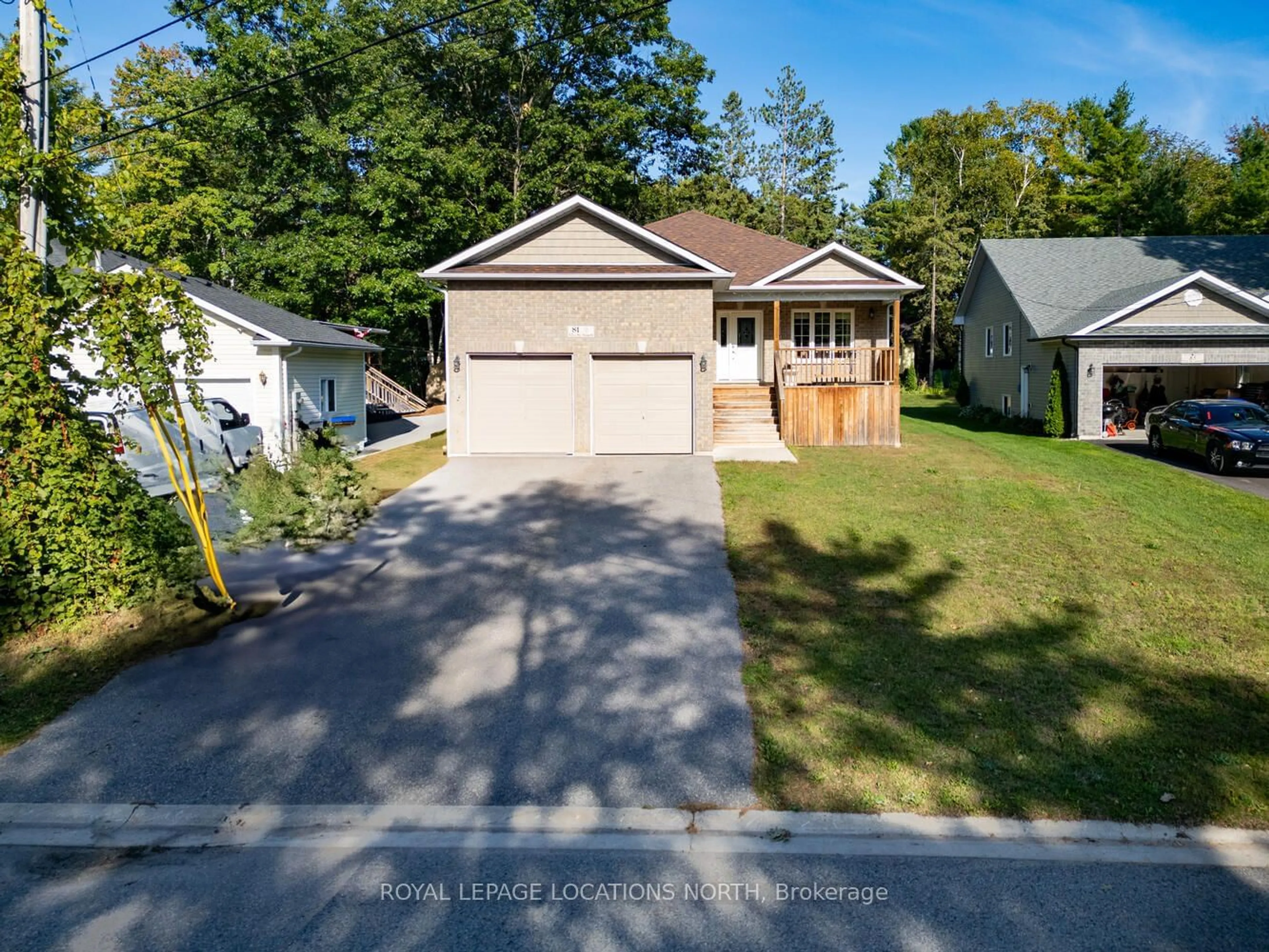 Frontside or backside of a home, the street view for 81 52nd St, Wasaga Beach Ontario L9Z 1Y1