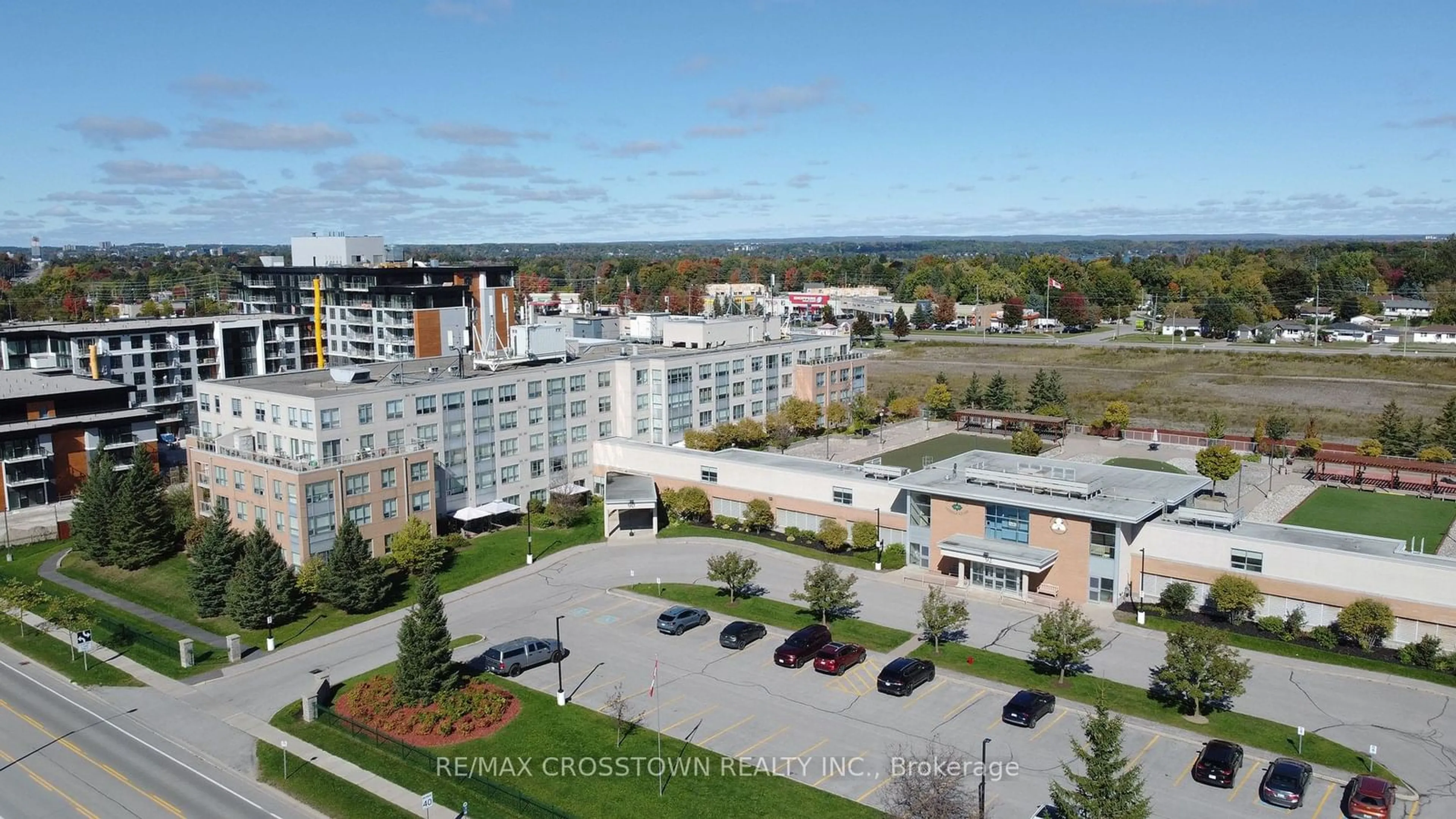 A pic from exterior of the house or condo, the street view for 90 Dean Ave #412, Barrie Ontario L4N 0M3