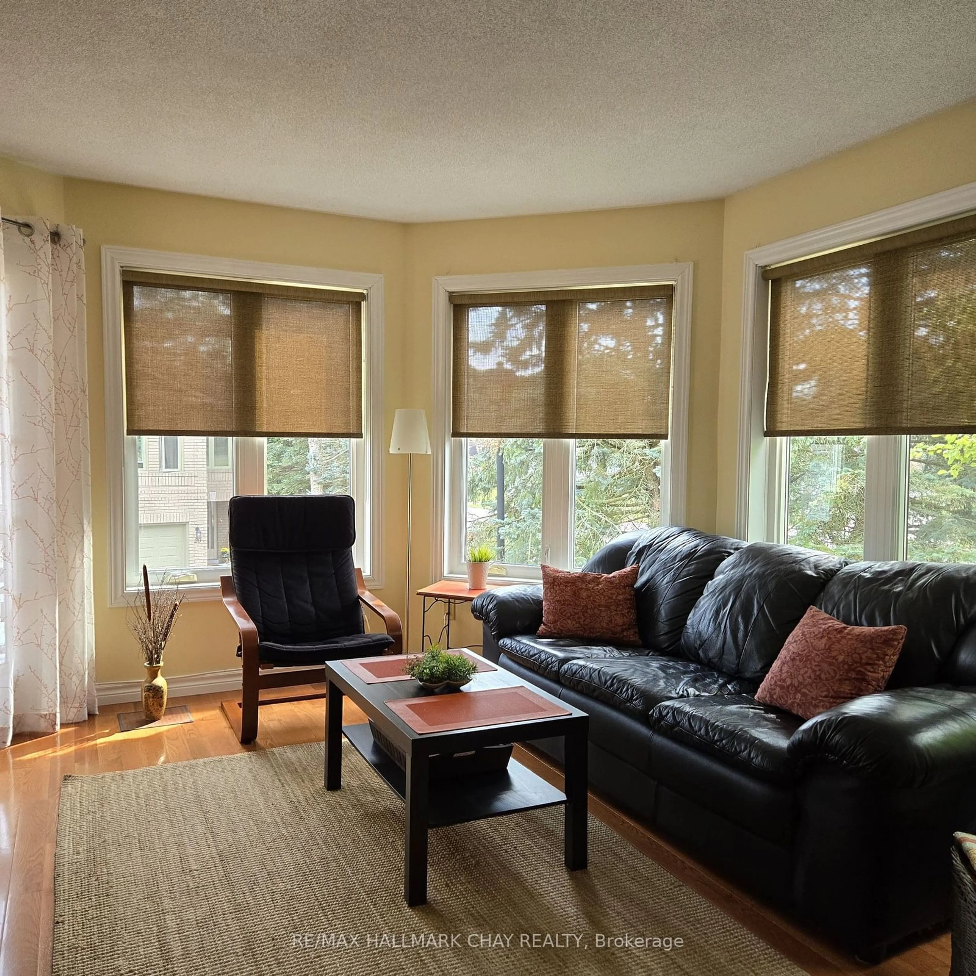 Living room, wood floors for 492 Laclie St #201, Orillia Ontario L3V 7V2