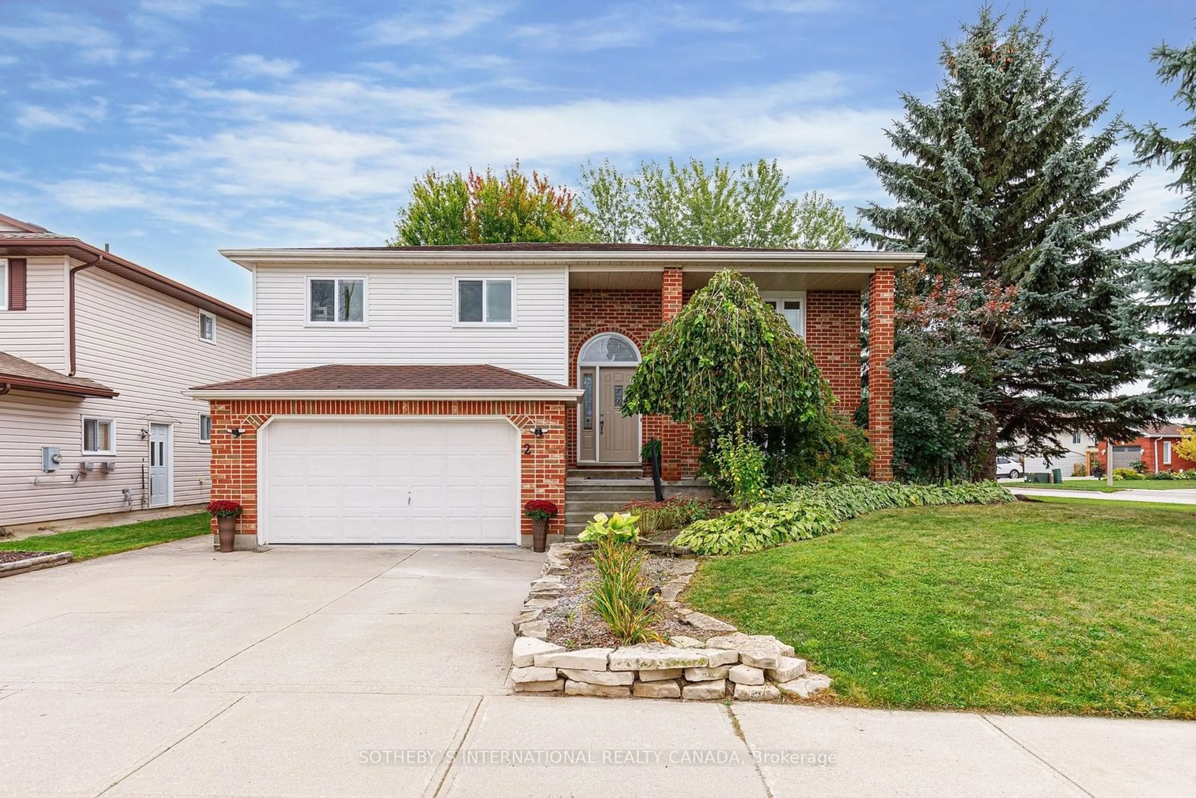 Frontside or backside of a home, the fenced backyard for 2 Bush St, Collingwood Ontario L9Y 4S9