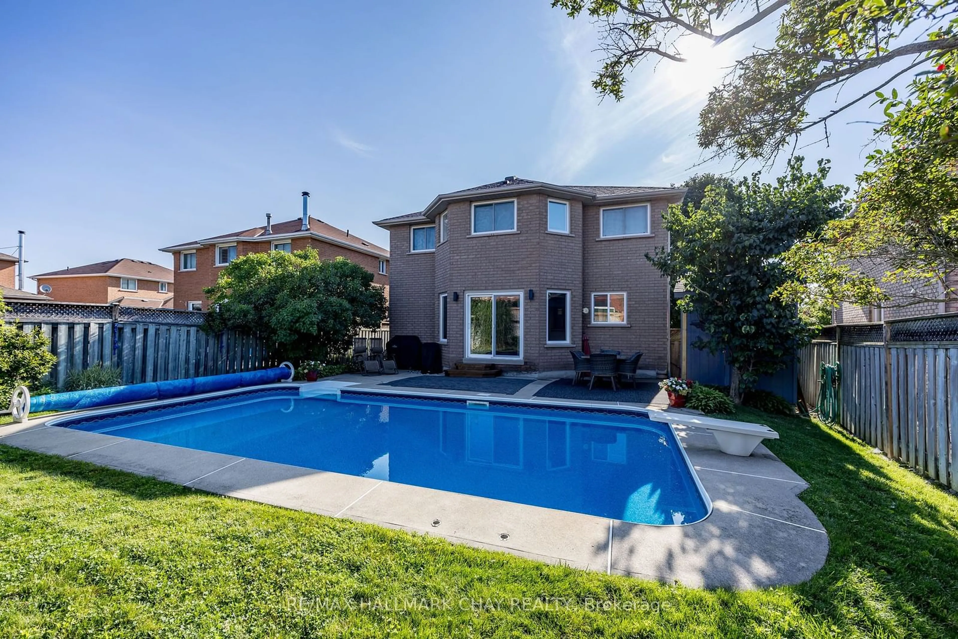 Frontside or backside of a home, the fenced backyard for 146 Hanmer St, Barrie Ontario L4N 7T3