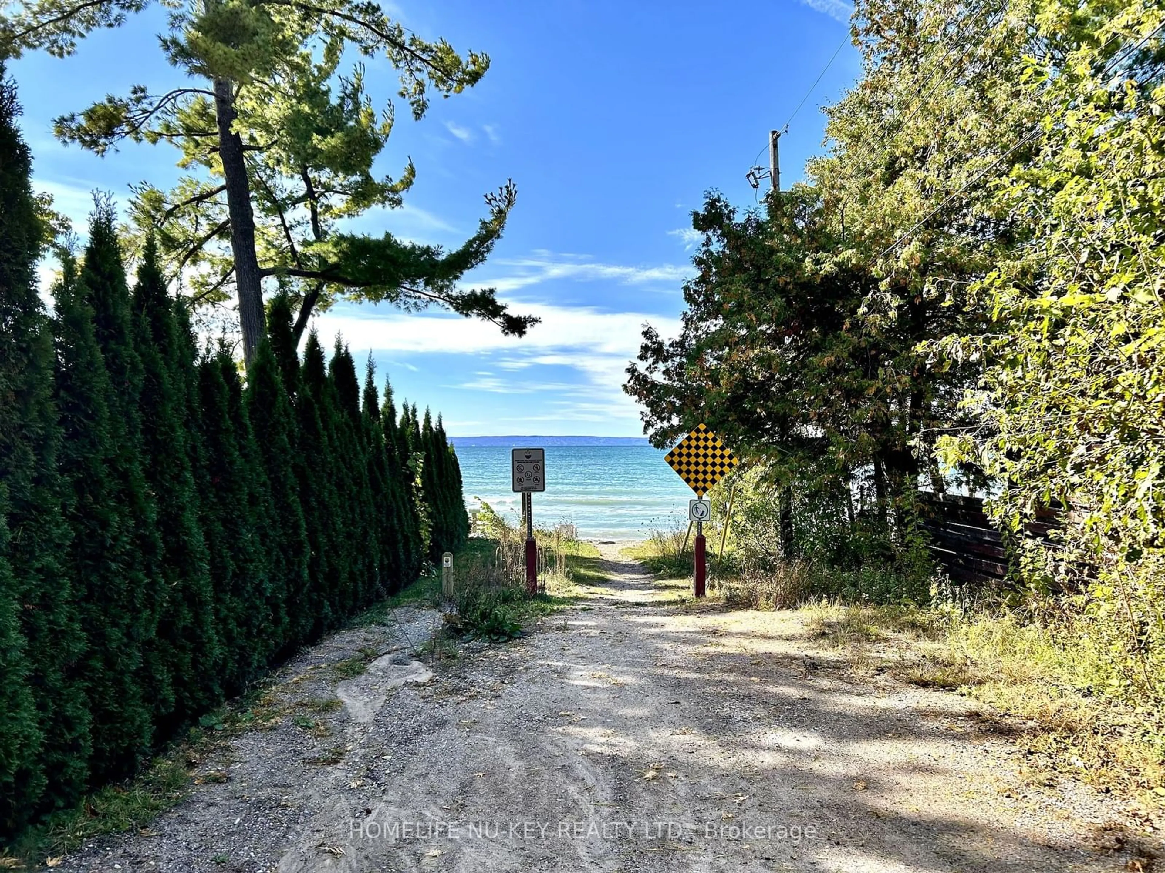 A pic from exterior of the house or condo, the street view for 28 Hastings Ave, Tiny Ontario L0L 1P0