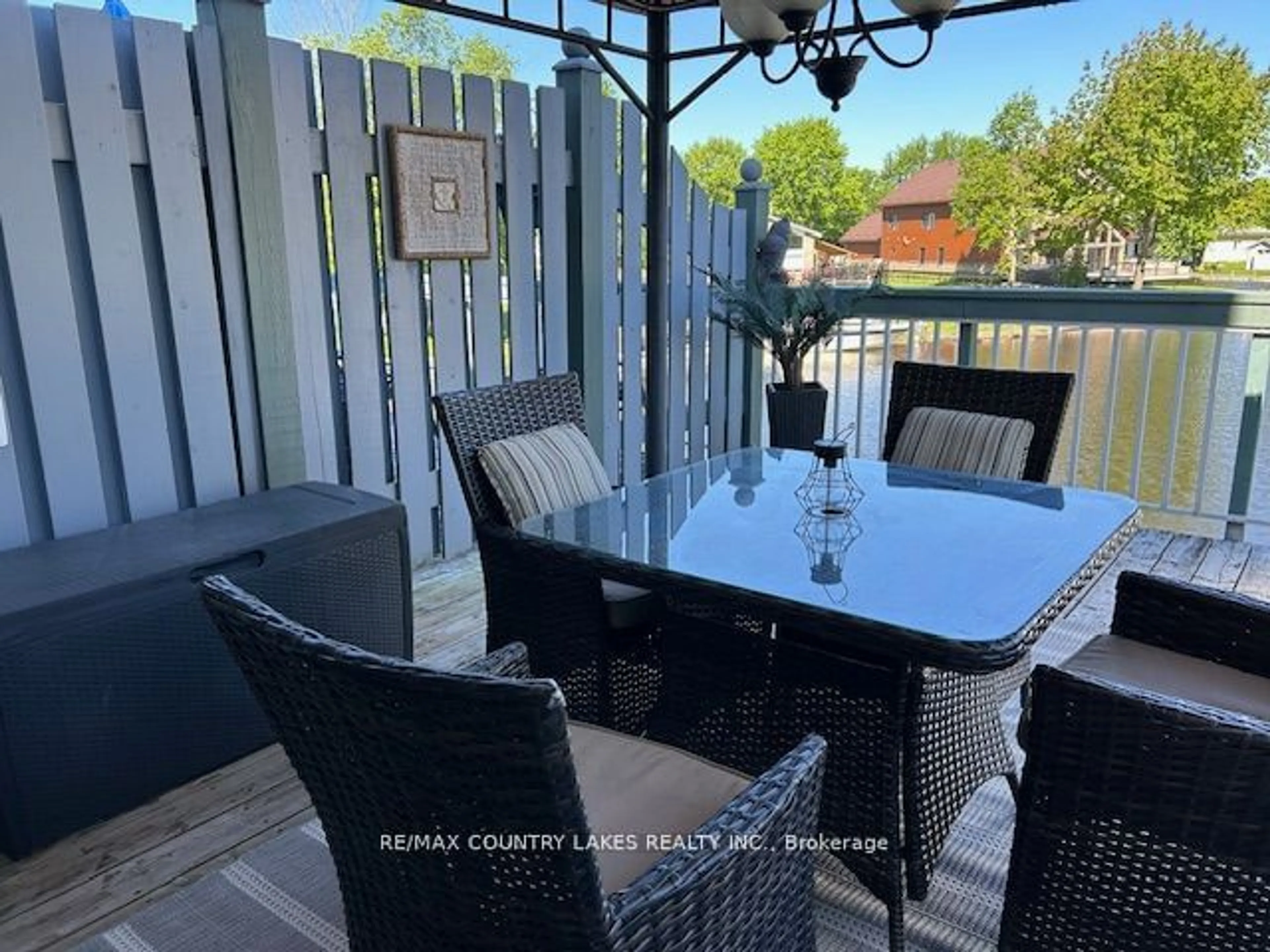 Patio, the fenced backyard for 30 Laguna Pkwy #6, Ramara Ontario L0K 1B0