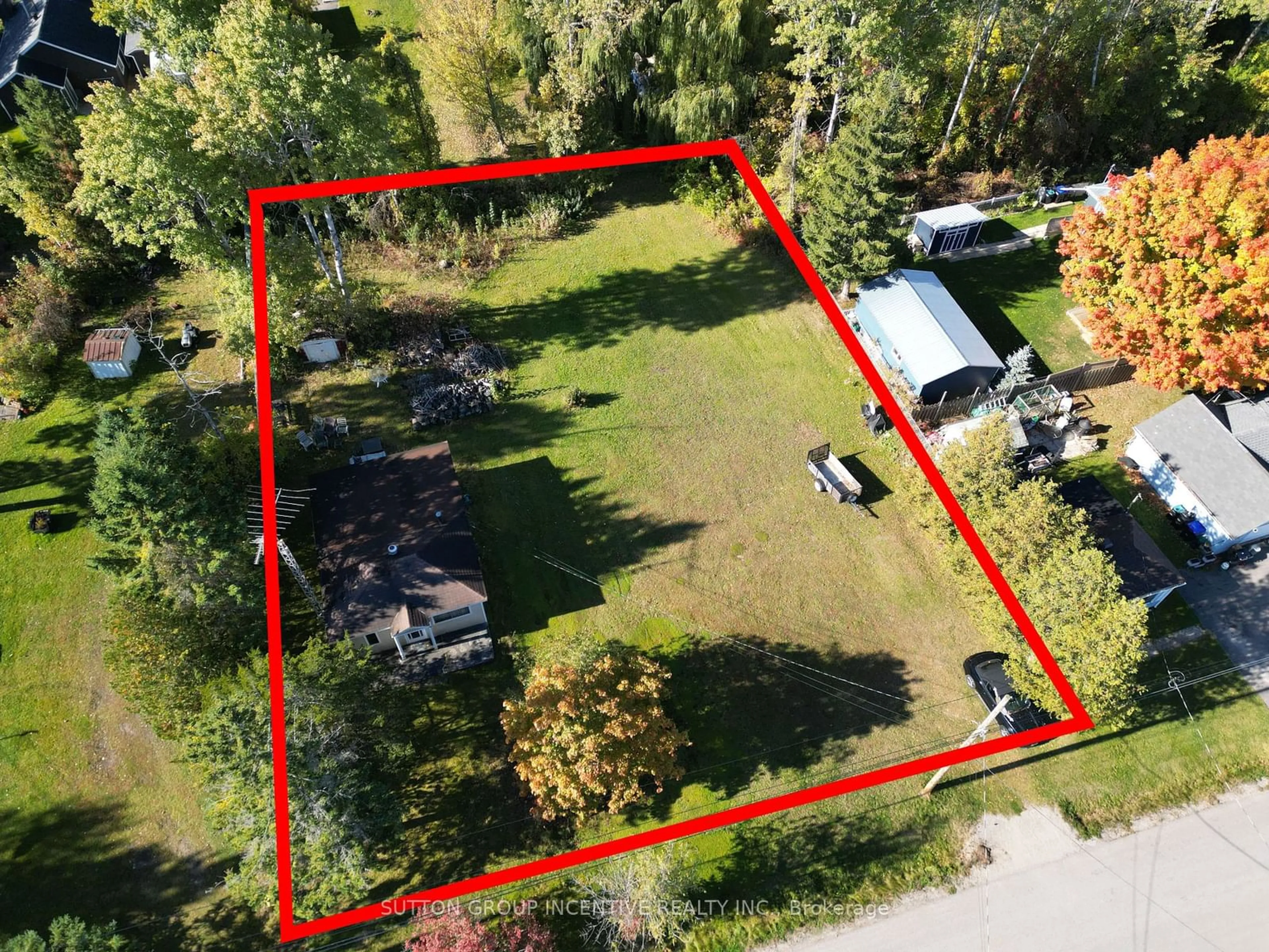 Frontside or backside of a home, the fenced backyard for 136-140 Limestone Rd, Tay Ontario L0K 1R0