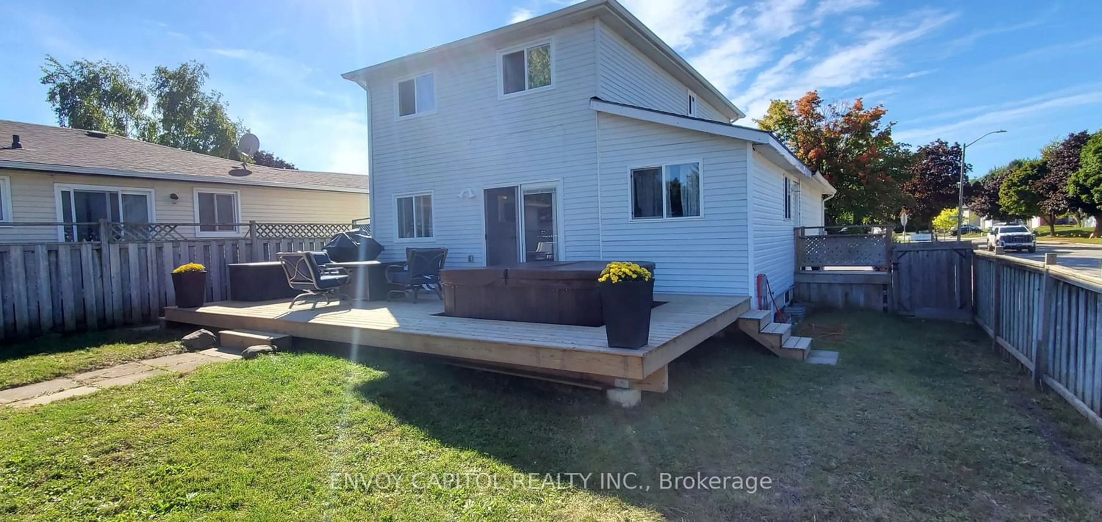 Frontside or backside of a home, the fenced backyard for 1 Mccuaig Crt, Barrie Ontario L4M 5S5