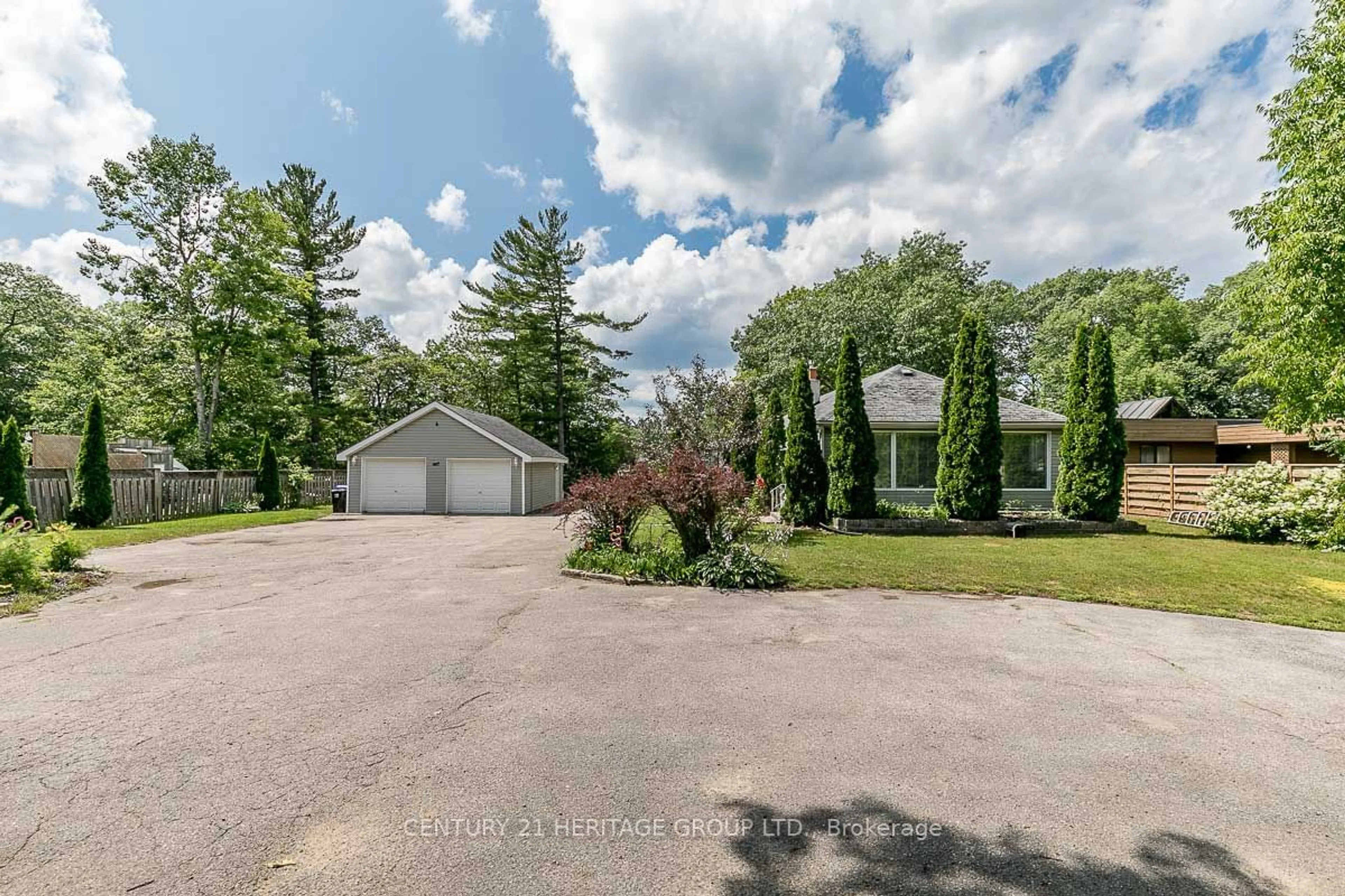 Frontside or backside of a home, the street view for 244 Oxbow Park Dr, Wasaga Beach Ontario L9Z 2V6