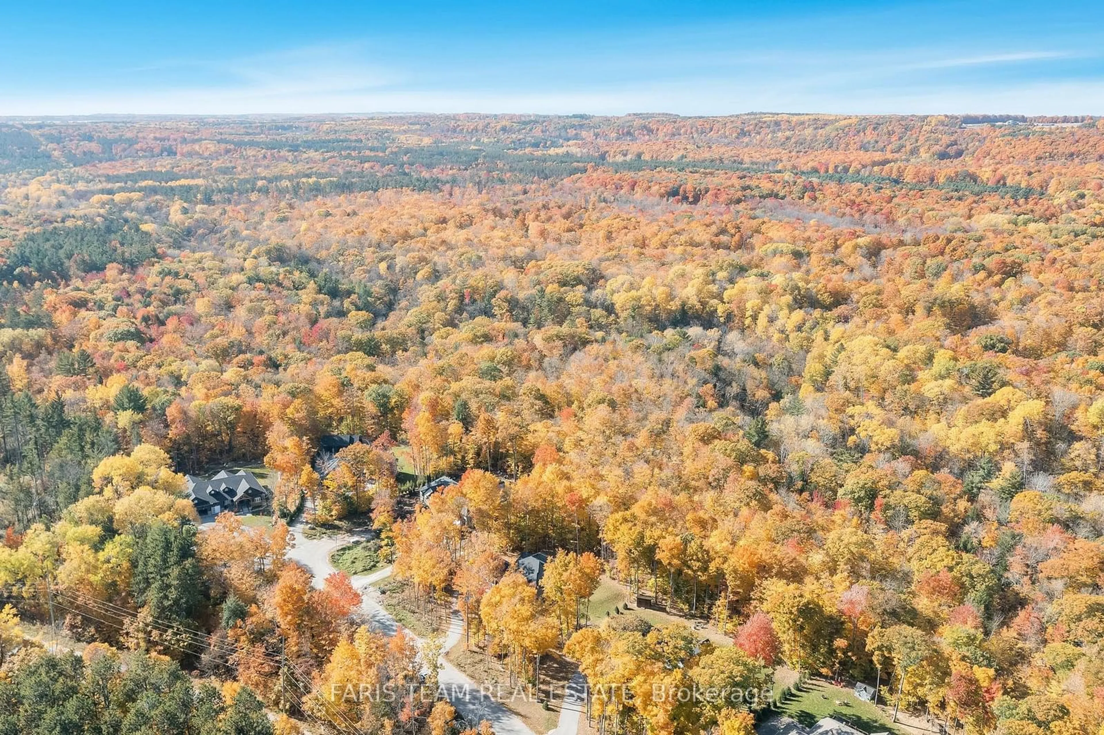 A pic from outside/outdoor area/front of a property/back of a property/a pic from drone, forest/trees view for 14 Glenn Howard Crt, Tiny Ontario L9M 0V9