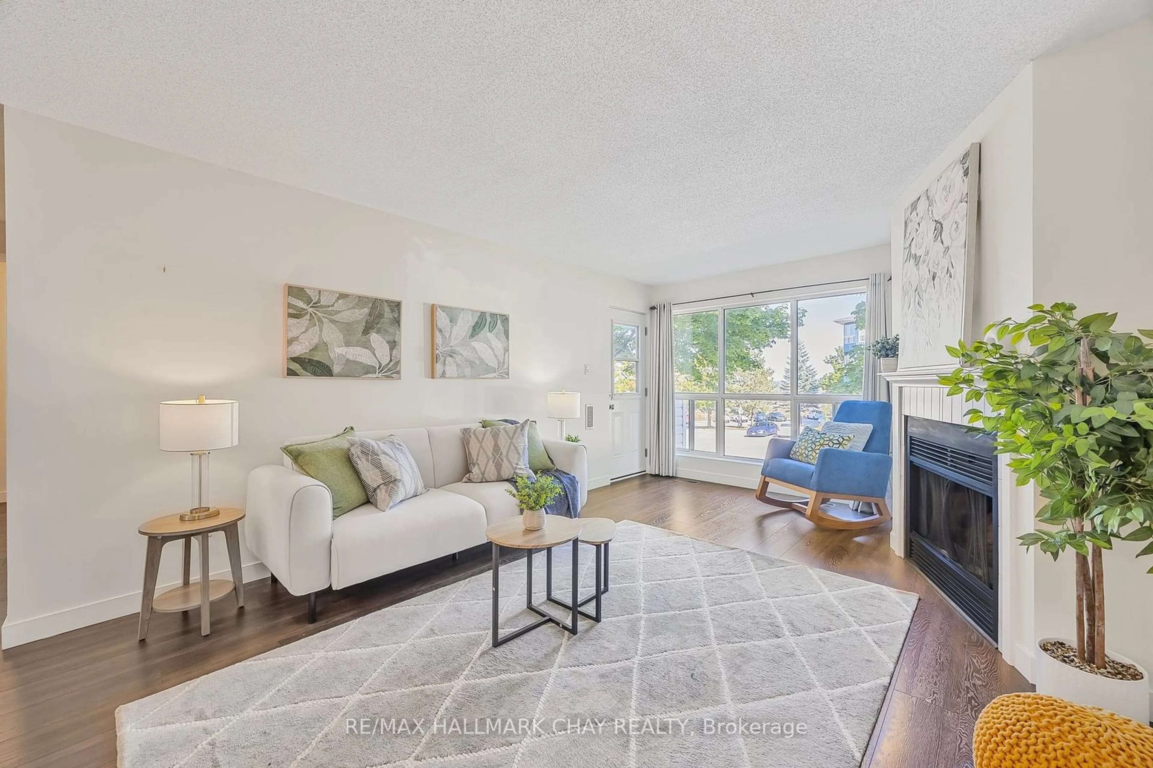 Living room, wood floors for 126 Bell Farm Rd #214, Barrie Ontario L4M 6J3