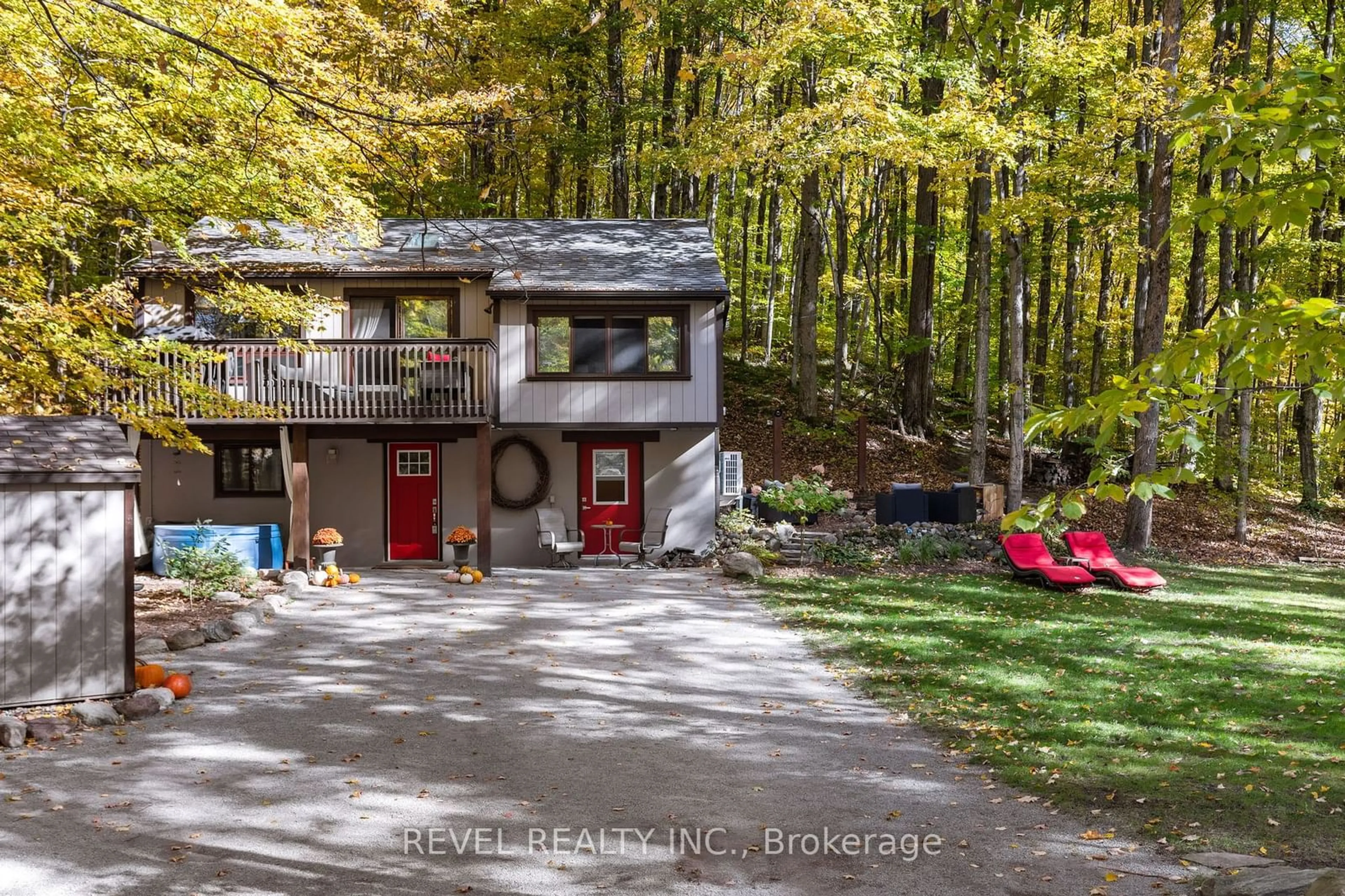 Frontside or backside of a home, cottage for 70 Huronwoods Dr, Oro-Medonte Ontario L0K 1E0