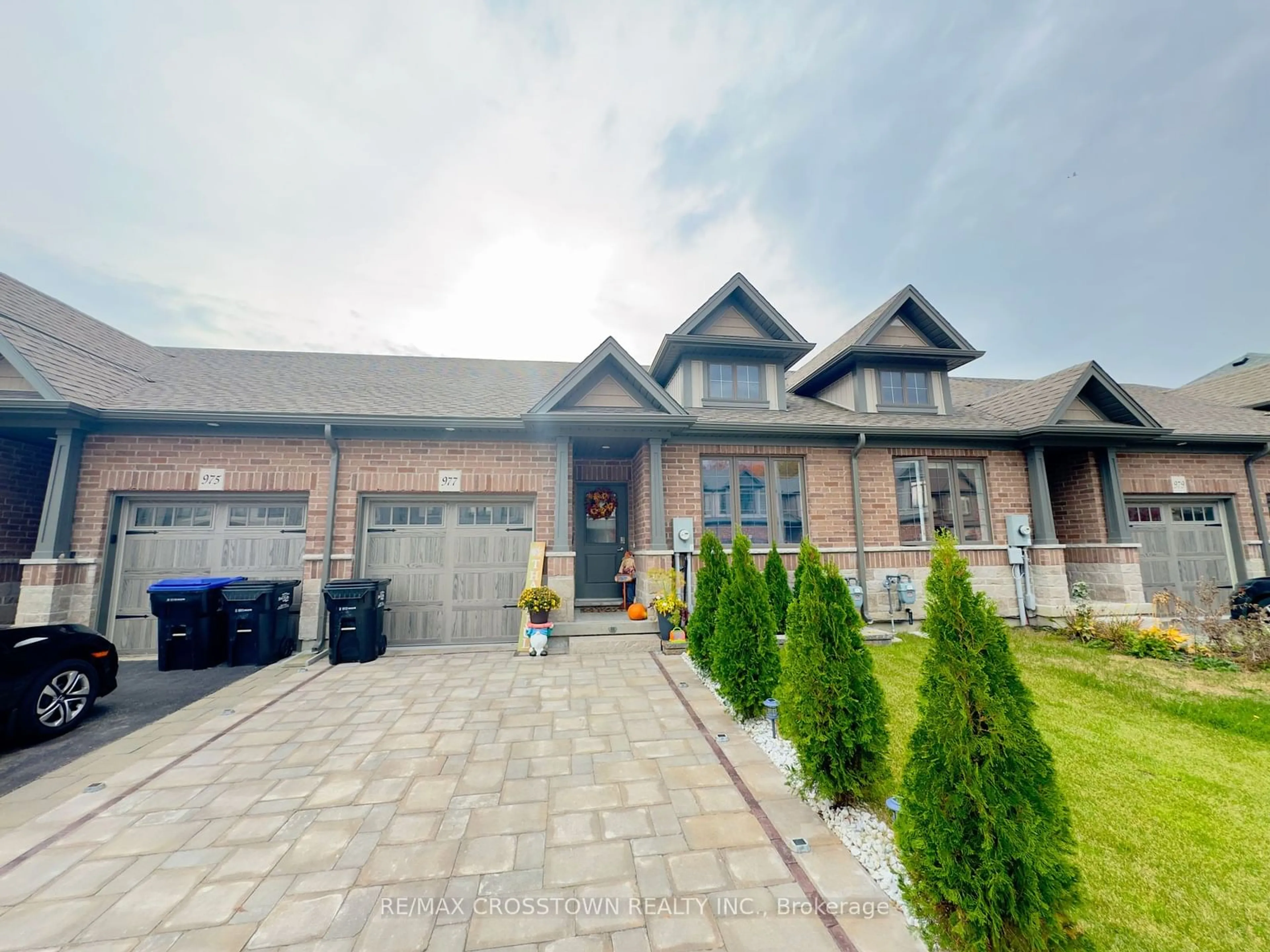 Frontside or backside of a home, the street view for 977 Wright Dr, Midland Ontario L4R 0E4