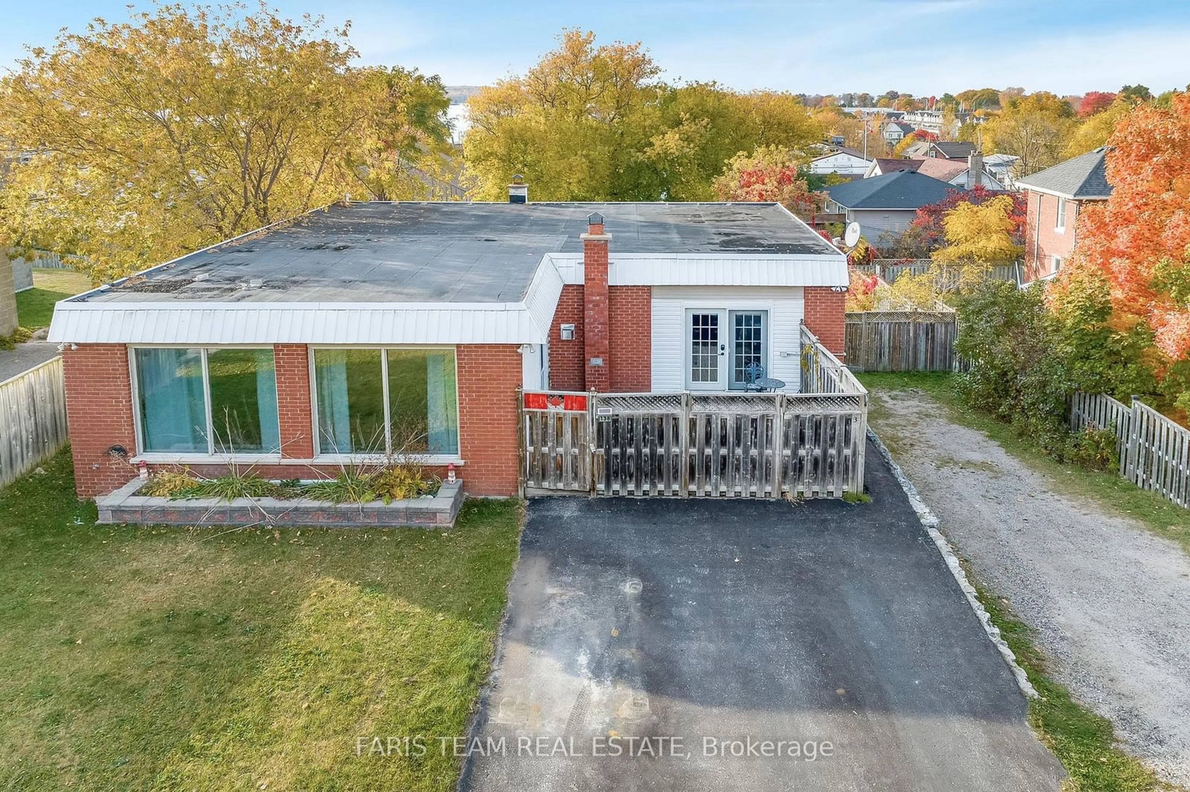 A pic from exterior of the house or condo, the fenced backyard for 138 Richard St, Tay Ontario L0K 2A0