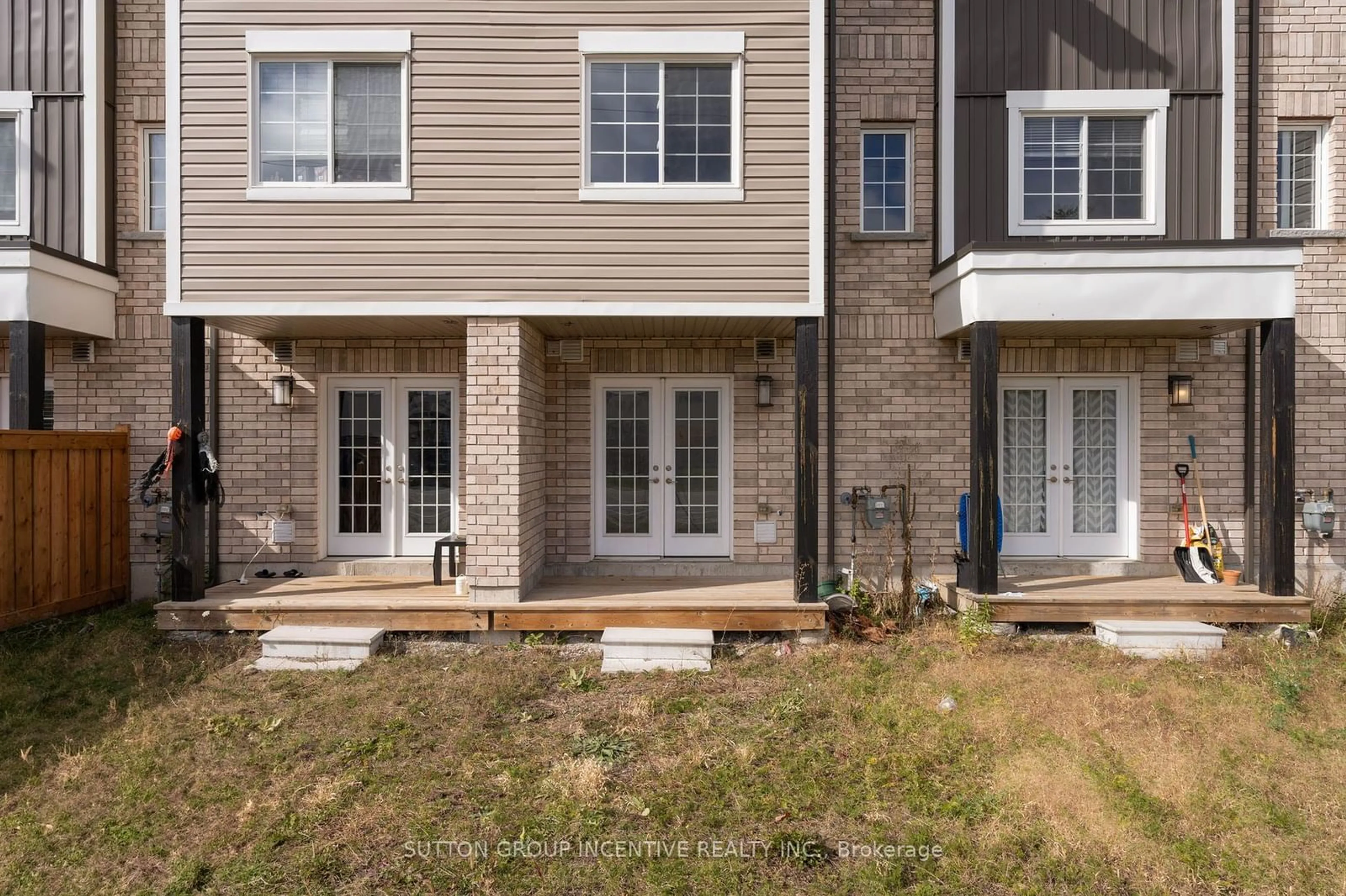 A pic from exterior of the house or condo, the fenced backyard for 53 Andean Lane, Barrie Ontario L9J 0B1