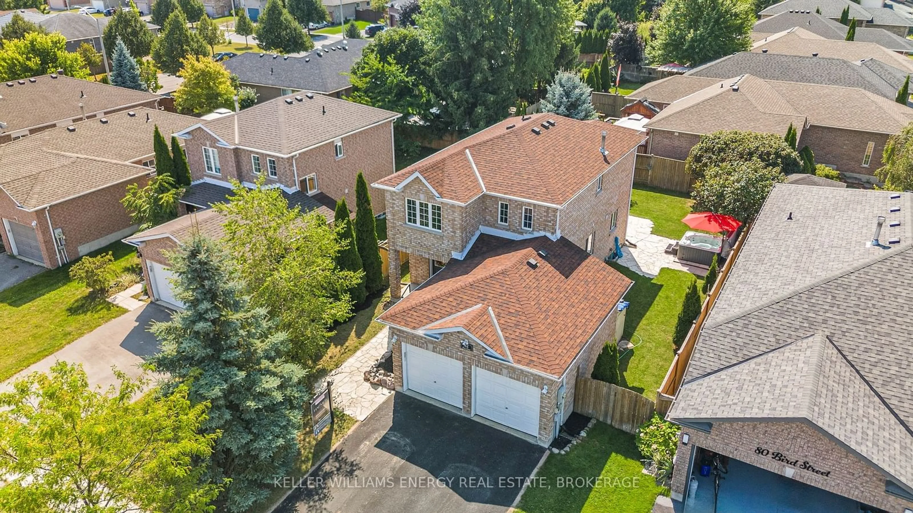 Frontside or backside of a home, the fenced backyard for 82 Bird St, Barrie Ontario L4N 0X3