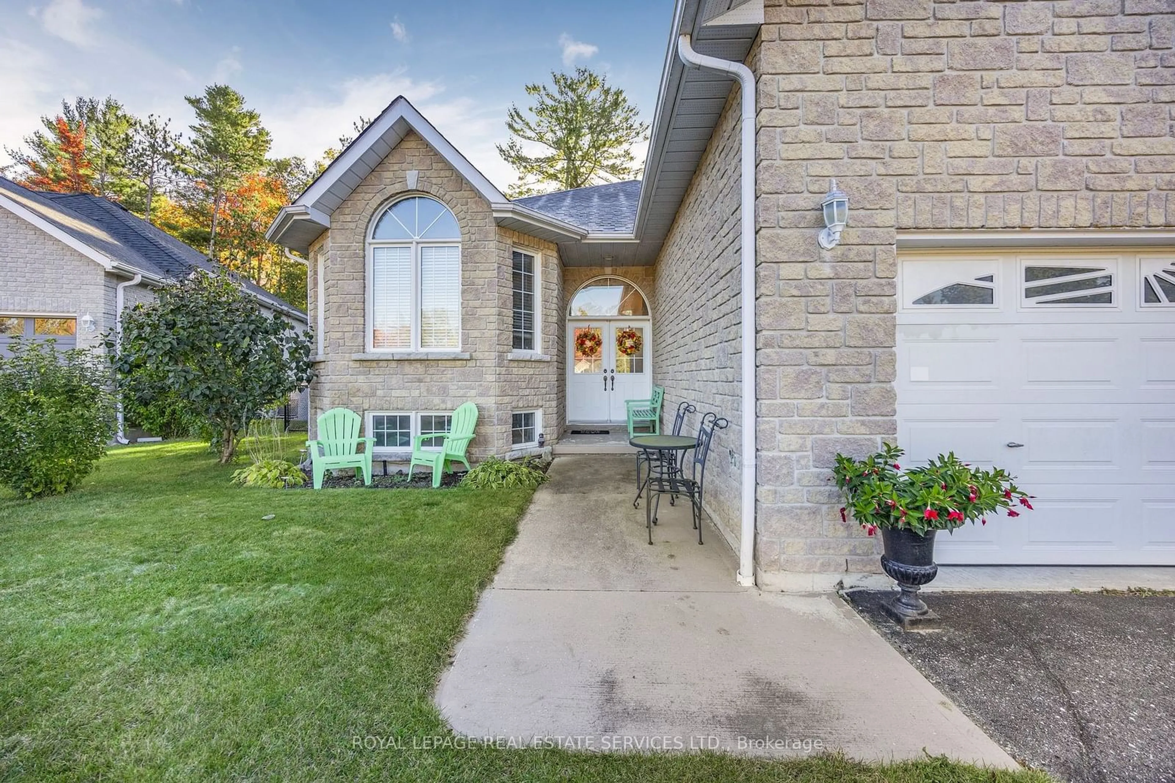 A pic from exterior of the house or condo, the fenced backyard for 46 Donato Way, Wasaga Beach Ontario L9Z 1R9