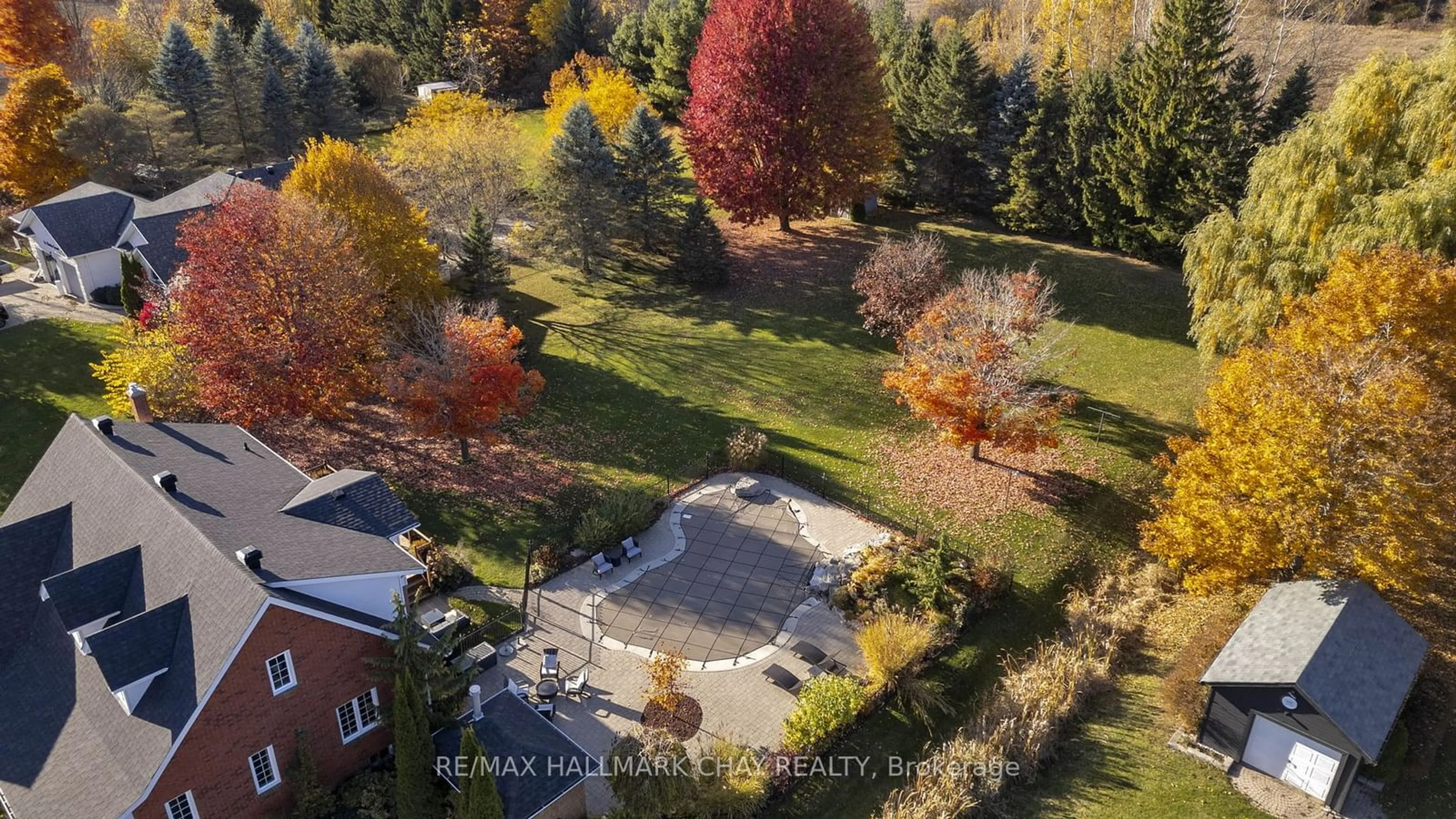 A pic from exterior of the house or condo, the fenced backyard for 8 Martine Cres, Oro-Medonte Ontario L0L 2L0