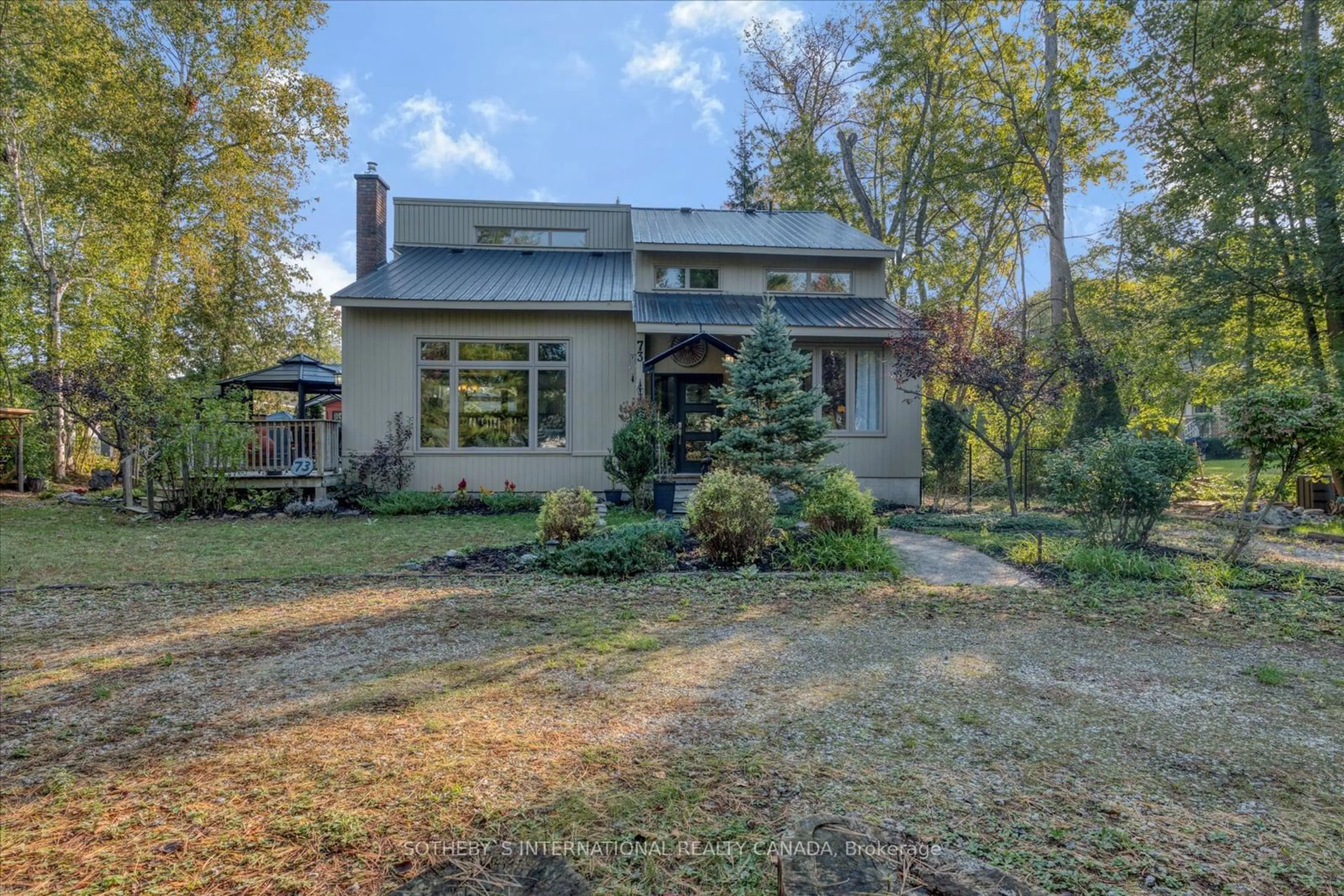 Frontside or backside of a home, cottage for 73 53rd St, Wasaga Beach Ontario L9Z 1W8