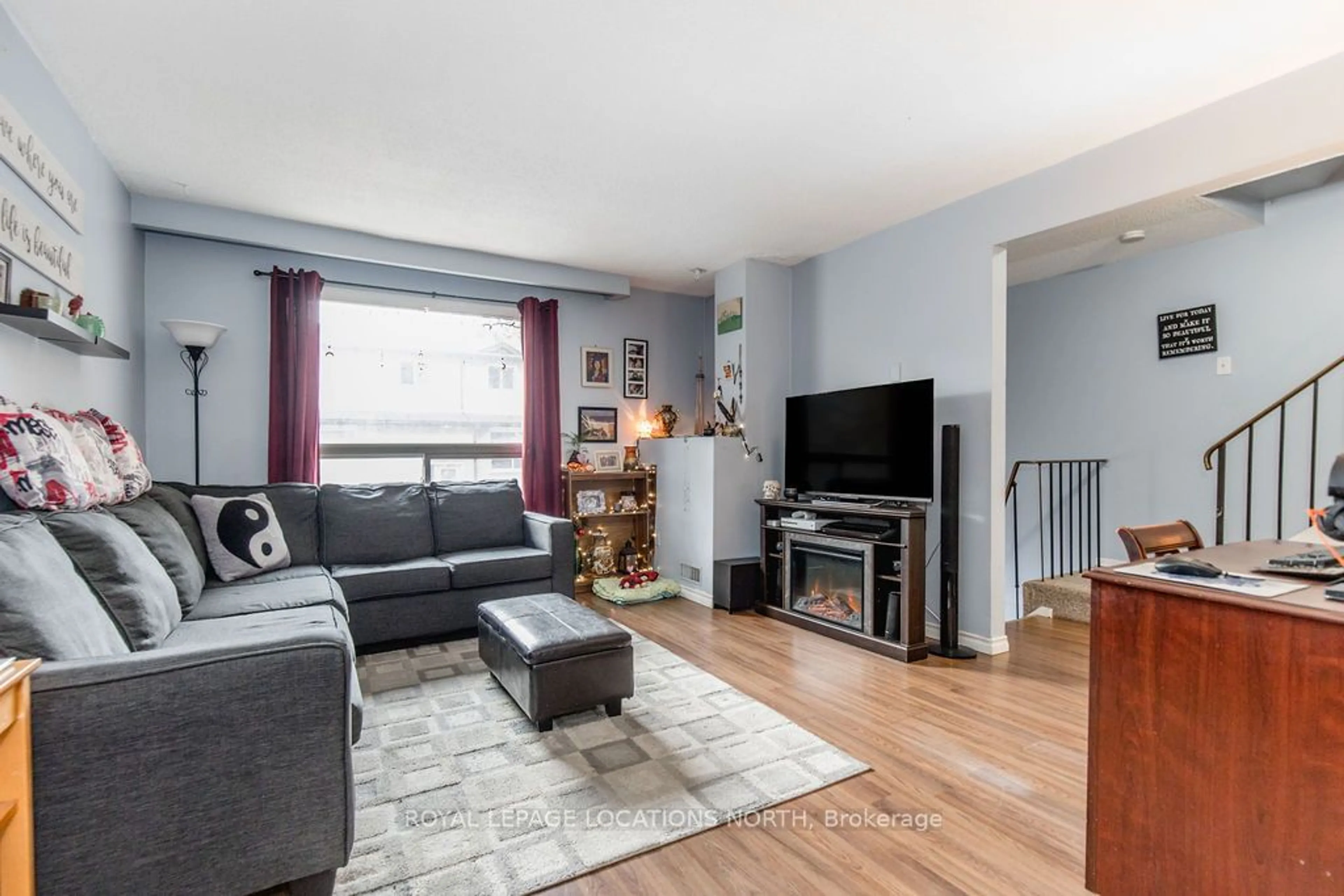 Living room, wood floors for 1095 Mississaga St #77, Orillia Ontario L3V 6W7