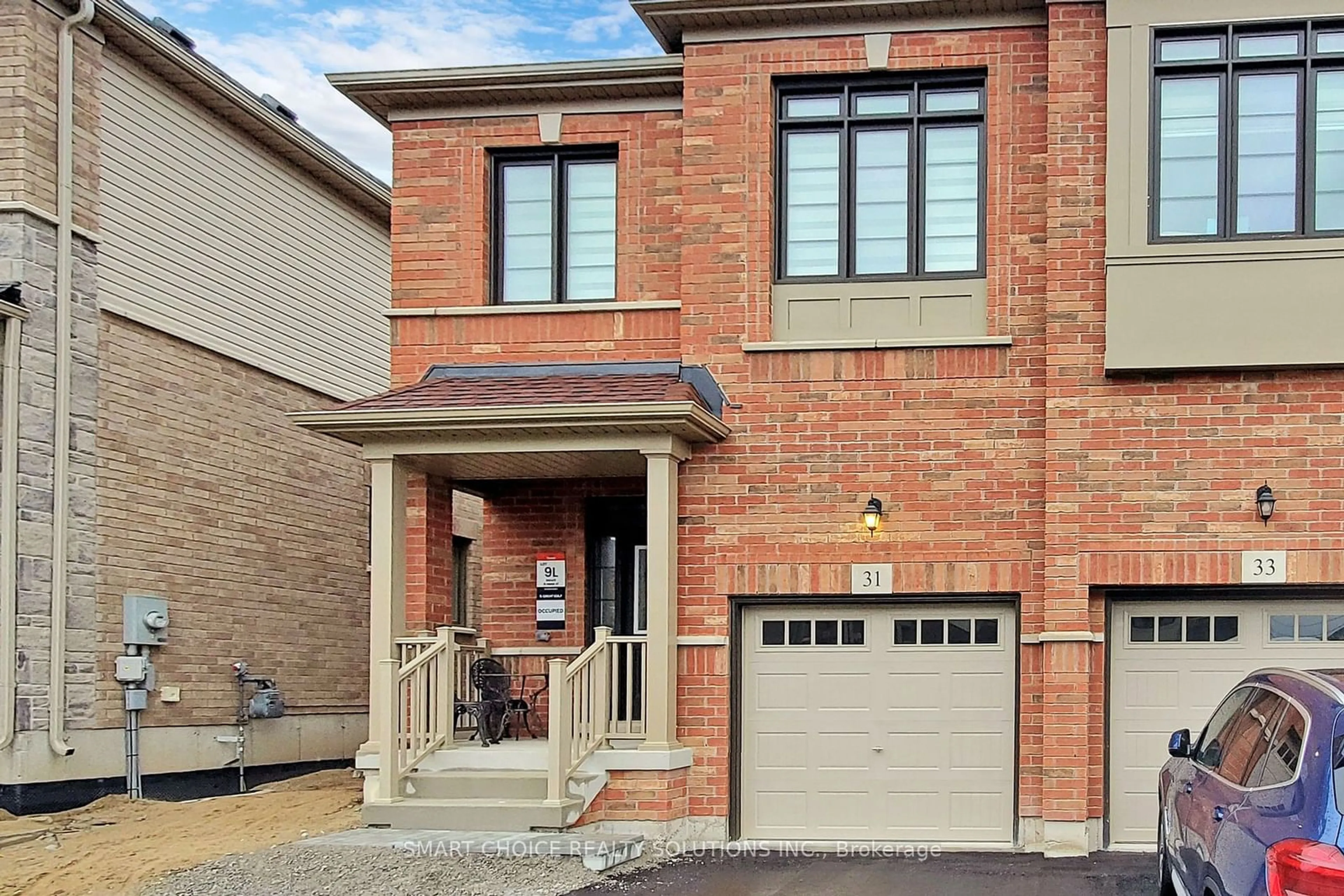 Home with brick exterior material for 31 Greer St, Barrie Ontario L9J 0C3