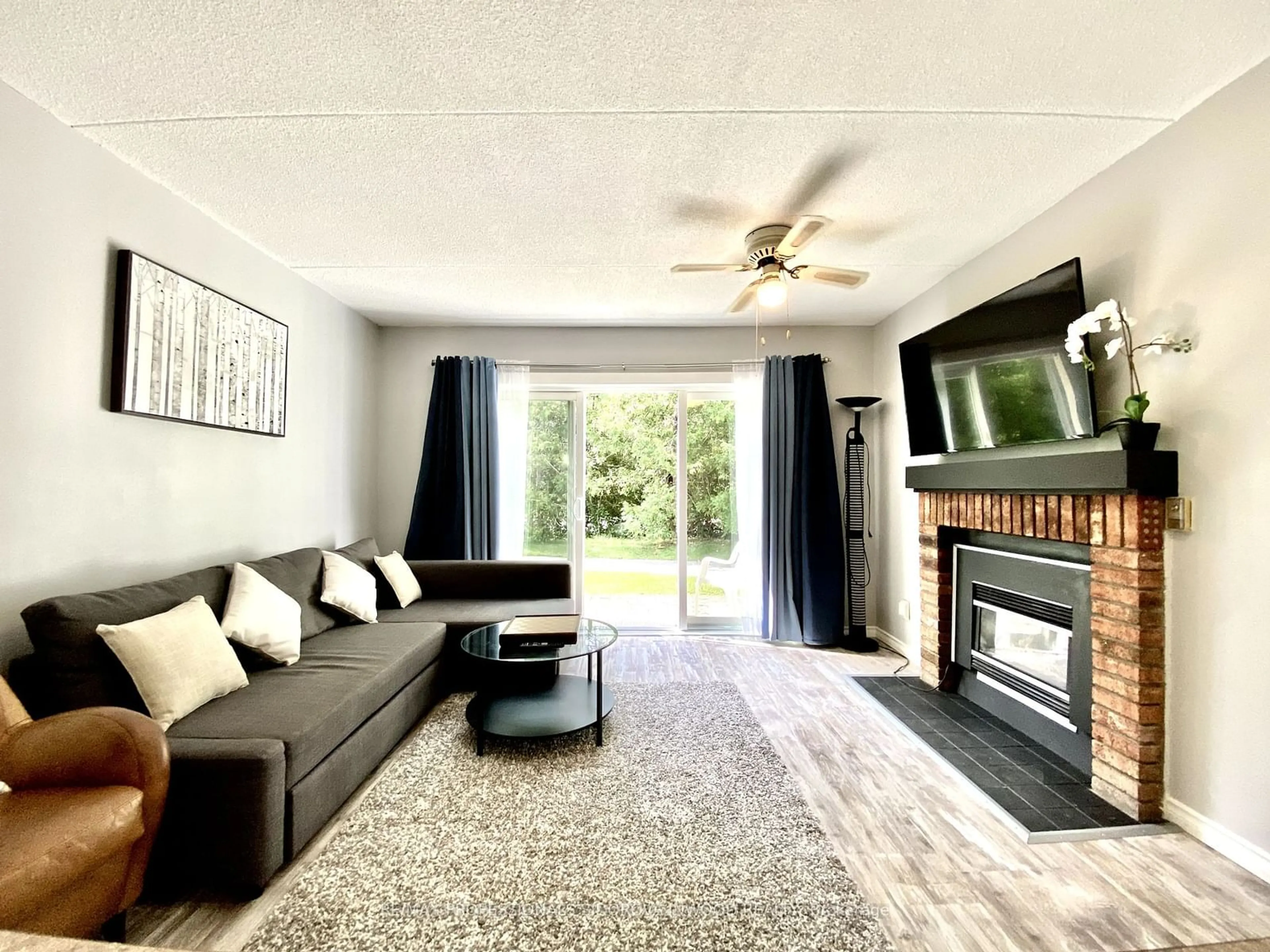 Living room, wood floors for 21 Dawson Dr #74, Collingwood Ontario L9Y 5B4