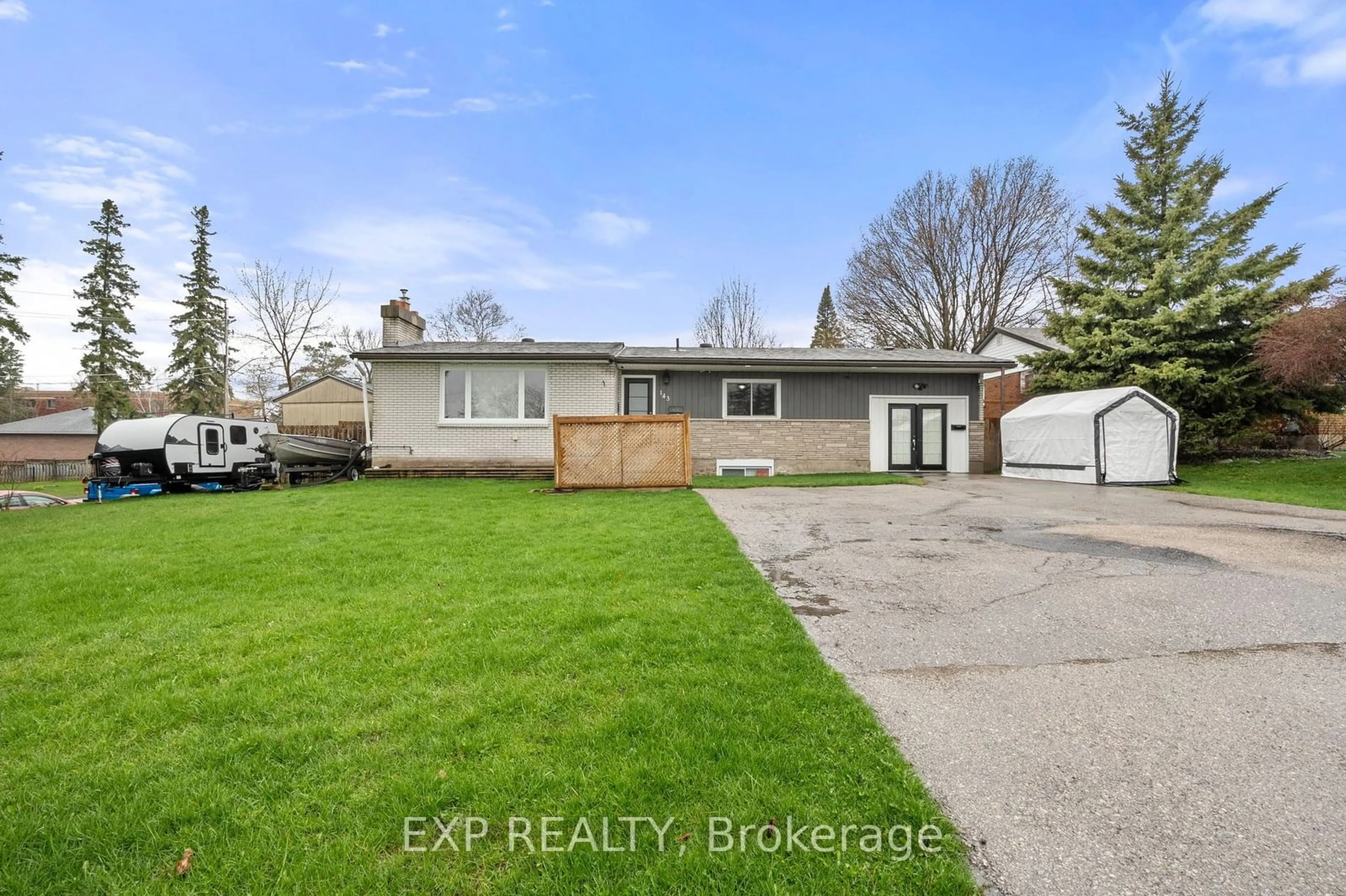 Frontside or backside of a home, the fenced backyard for 143 Westmount Dr, Orillia Ontario L3V 6C7