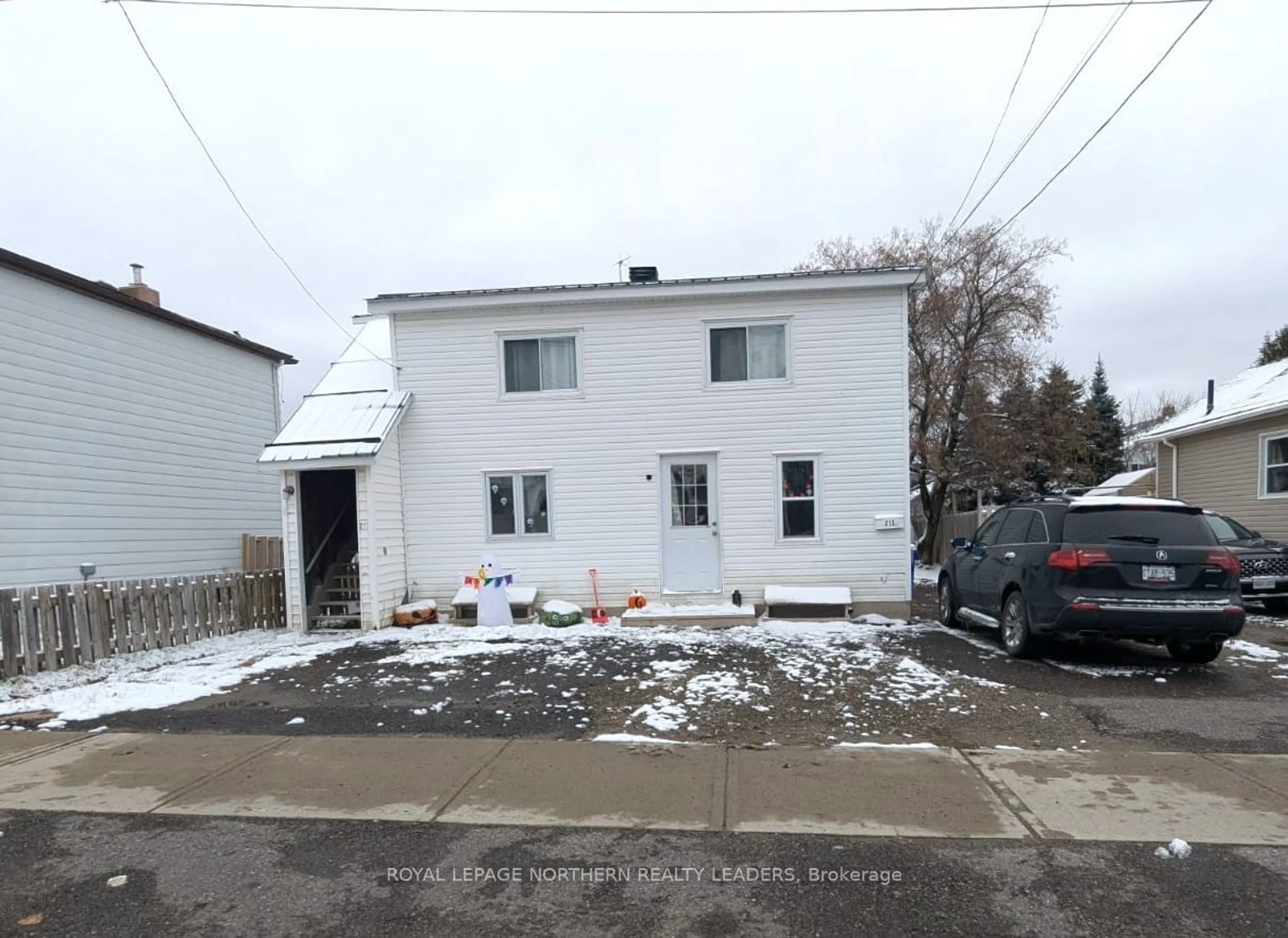 Frontside or backside of a home, the front or back of building for 211-215 Wende Ave, Timmins Ontario P4N 3E6