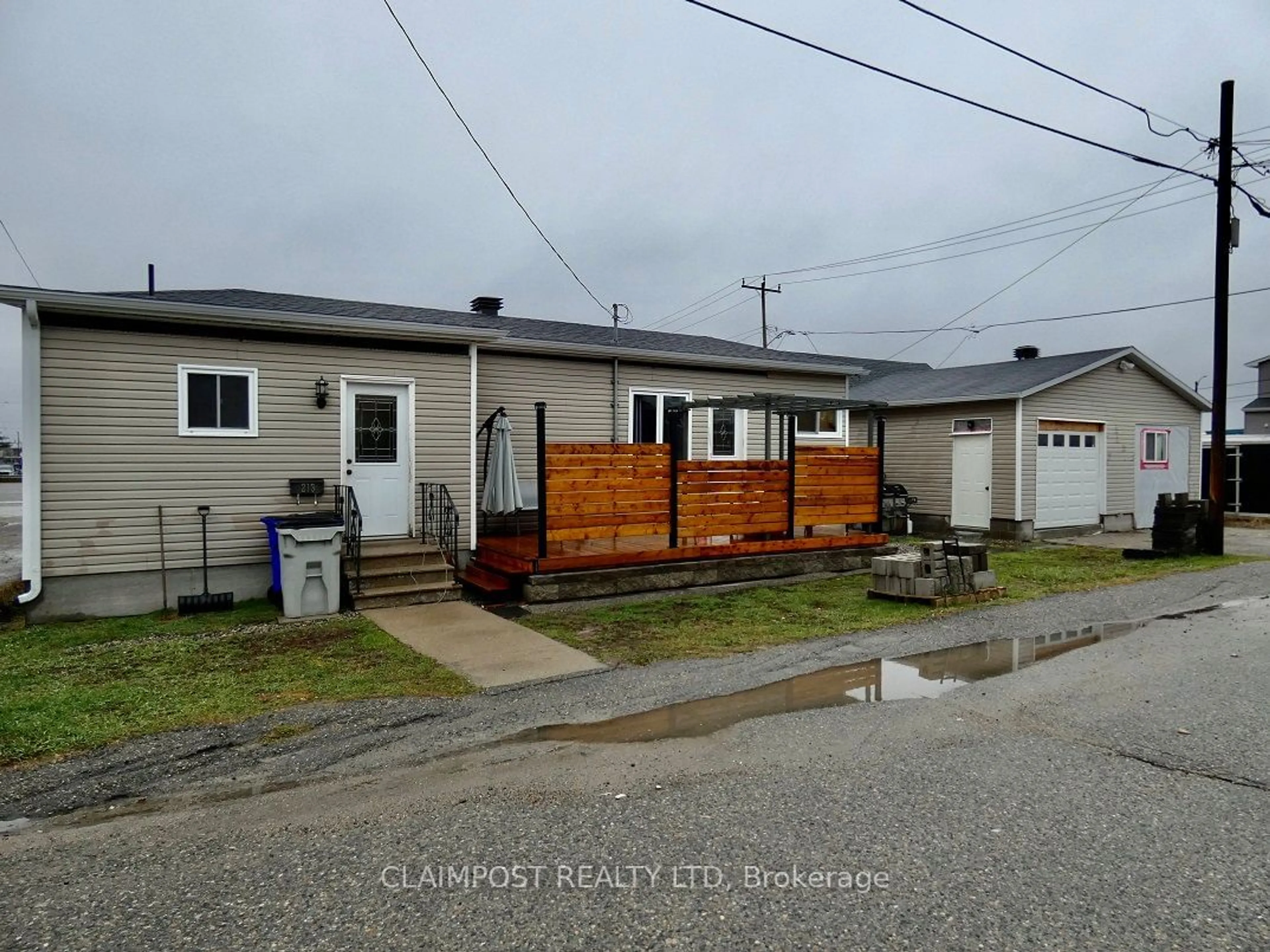 Frontside or backside of a home, the street view for 213 Laidlaw St, Timmins Ontario P4N 2P9