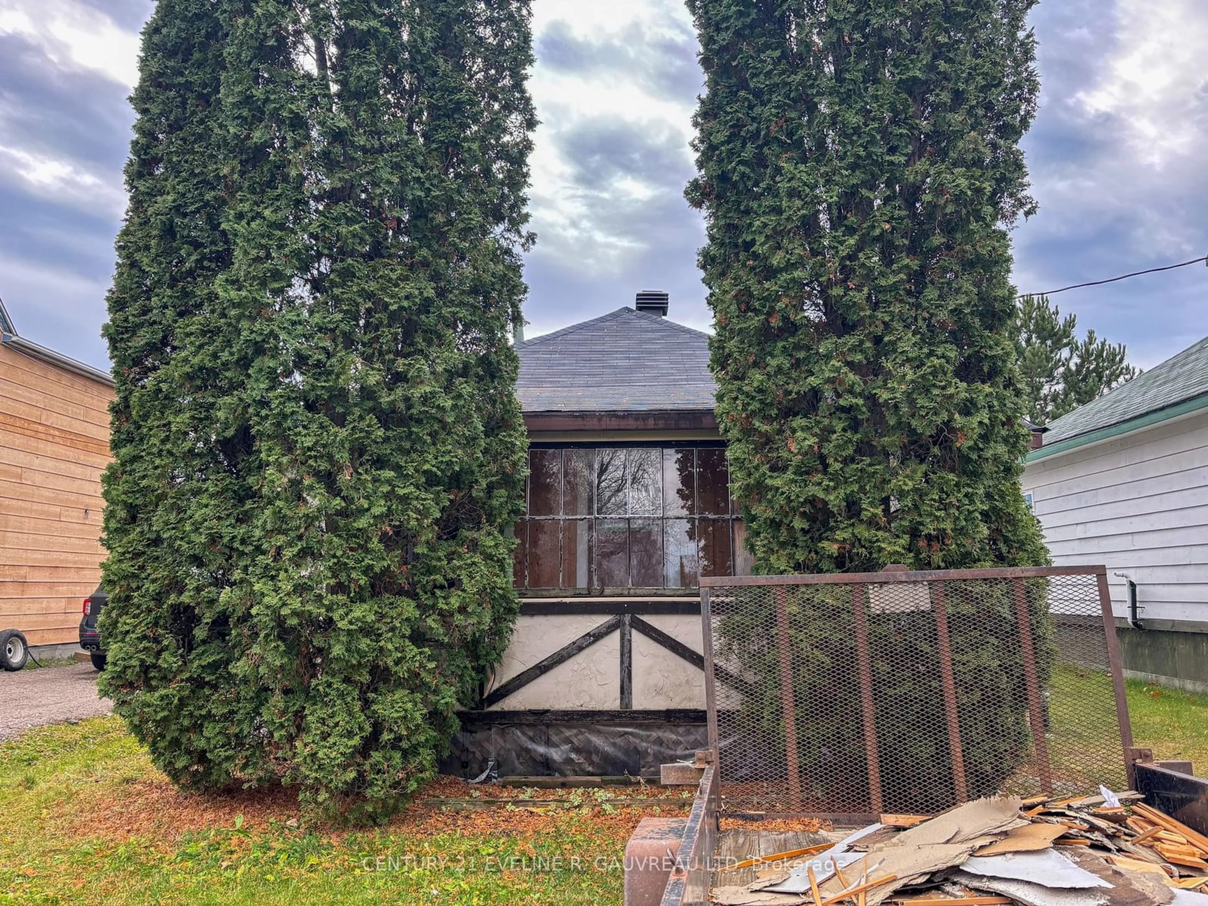 Frontside or backside of a home, the fenced backyard for 52A Seventh Ave, Englehart Ontario P0J 1H0