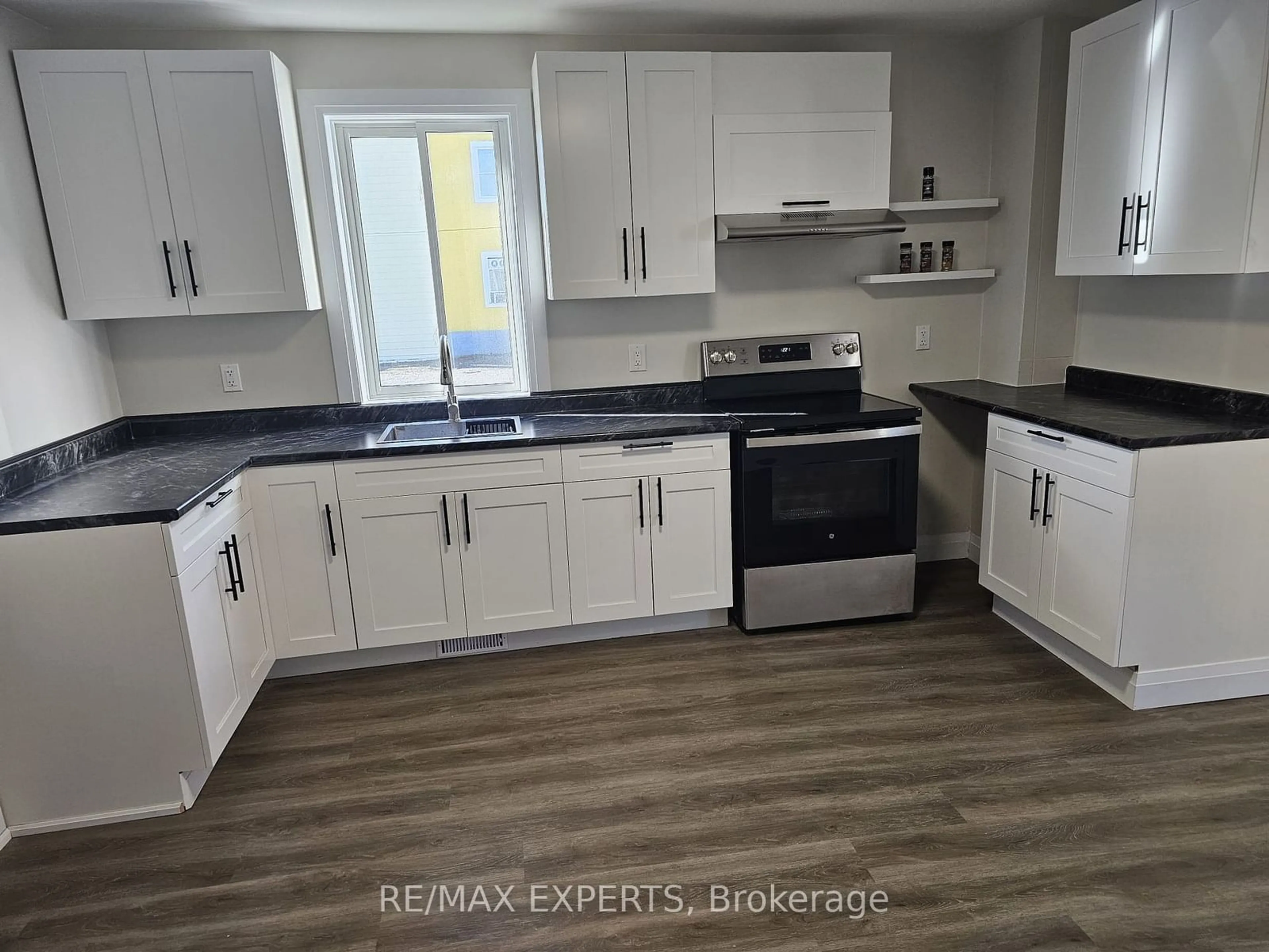 Open concept kitchen for 43 Kirkpatrick St, Kirkland Lake Ontario P2N 2H2