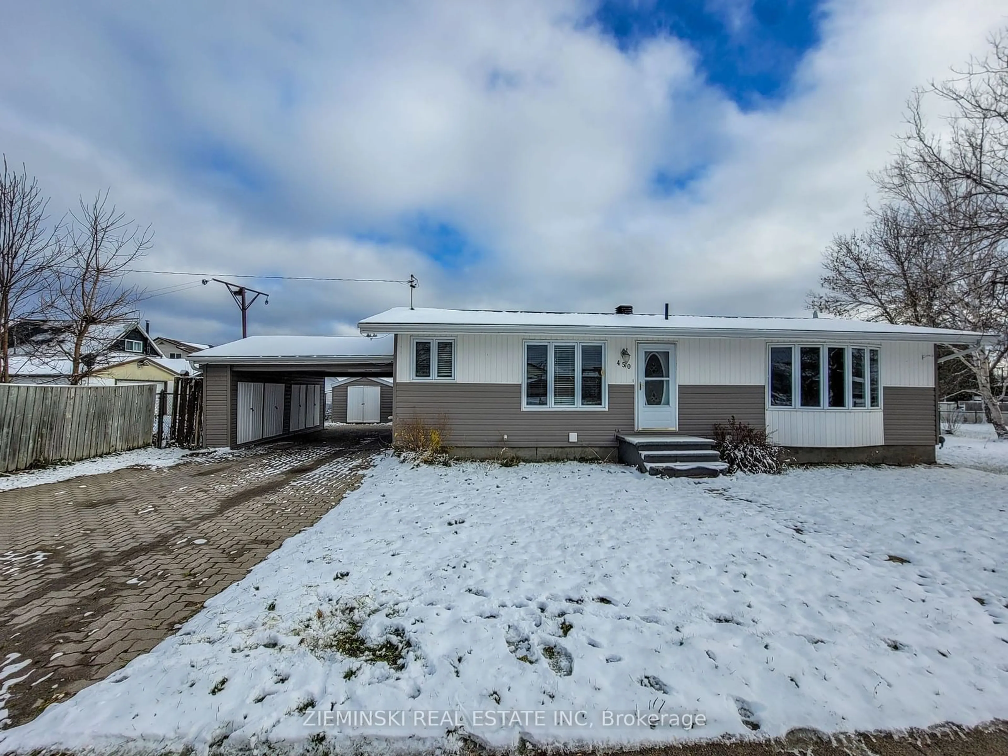 Frontside or backside of a home, the street view for 450 De Maricourt Ave, Iroquois Falls Ontario P0K 1G0