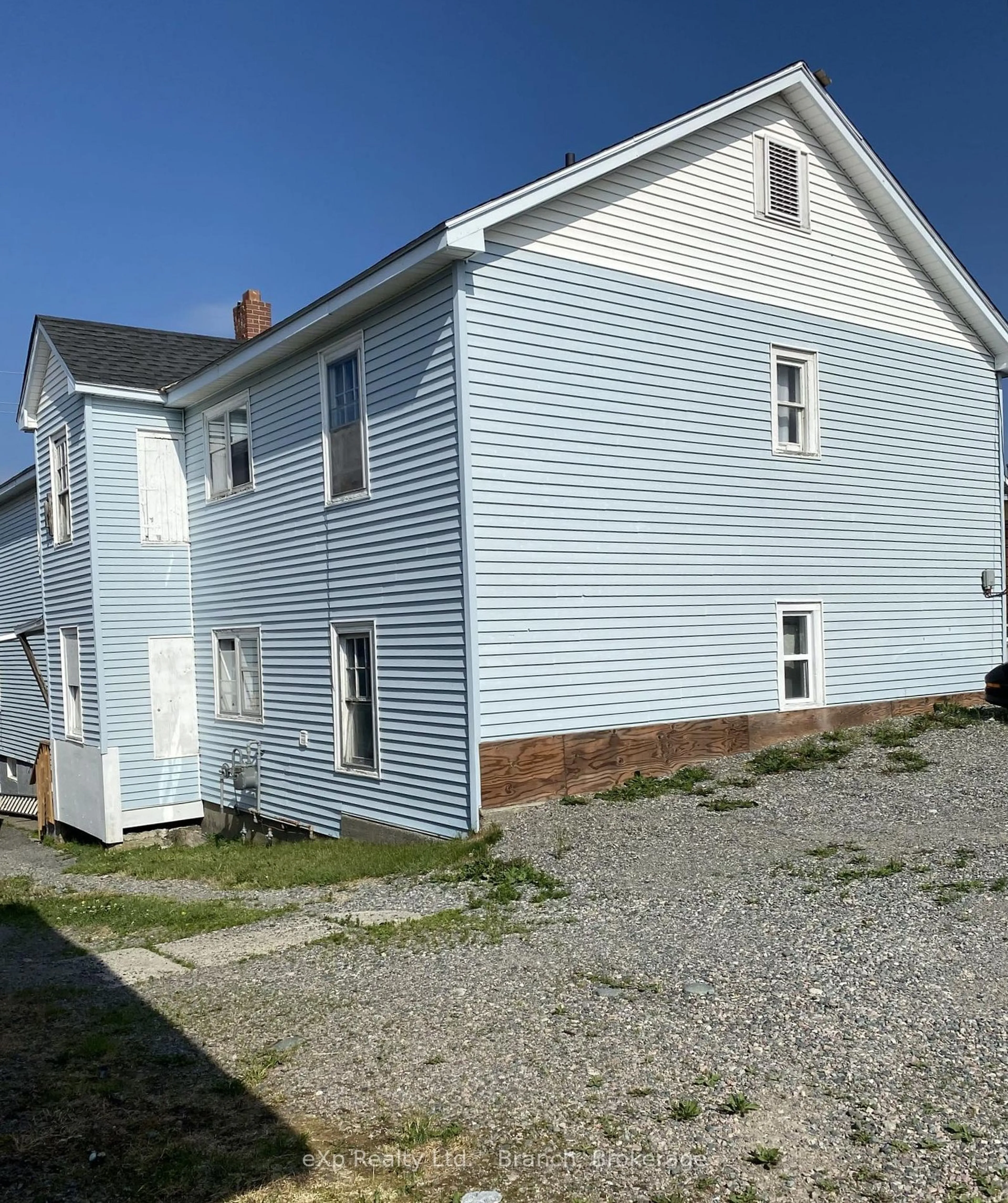 Frontside or backside of a home, the front or back of building for 41-44 Main St, Kirkland Lake Ontario P2N 3E2