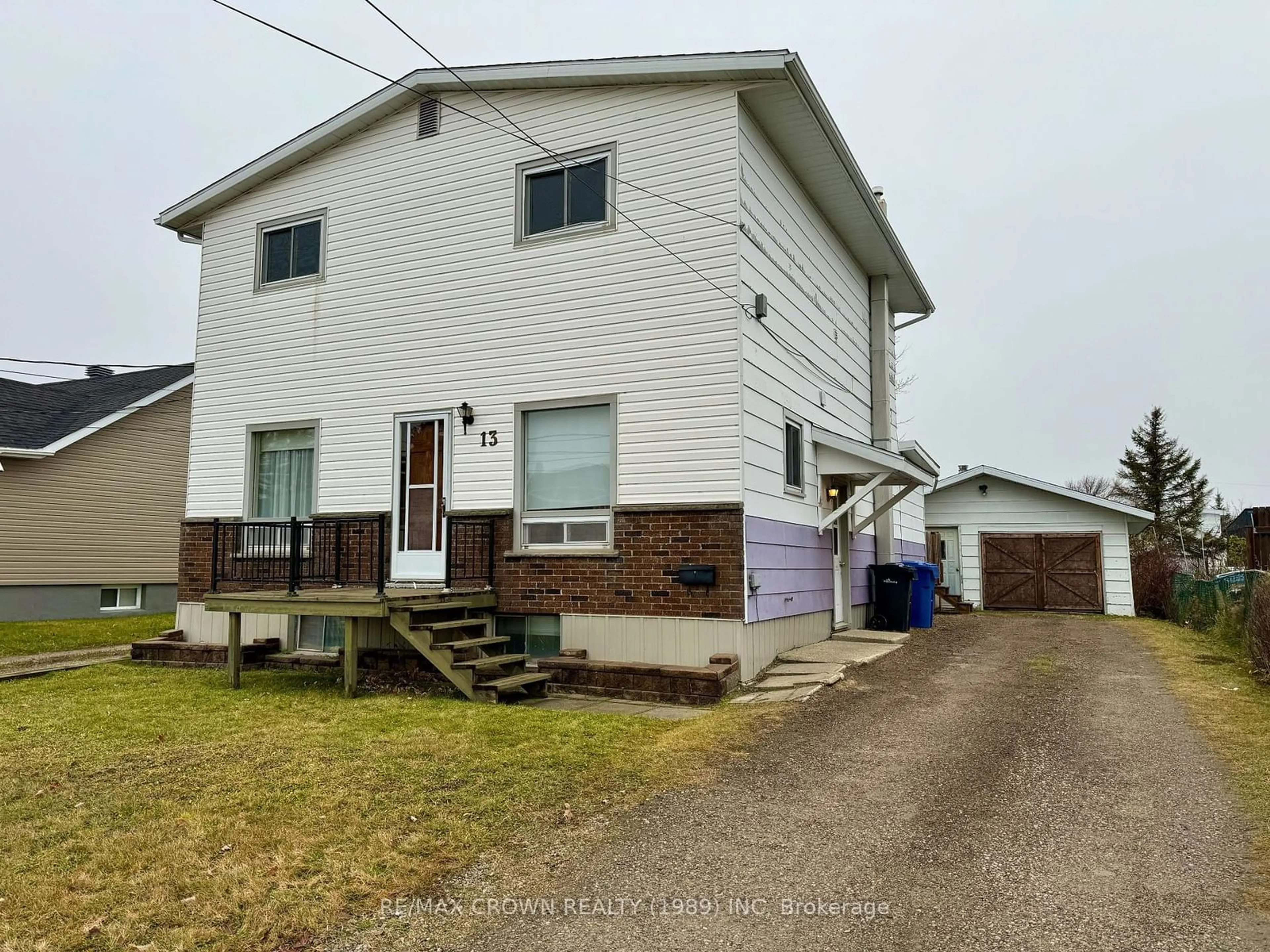 Frontside or backside of a home, the front or back of building for 13 Brock Cres, Kapuskasing Ontario P5N 2J9