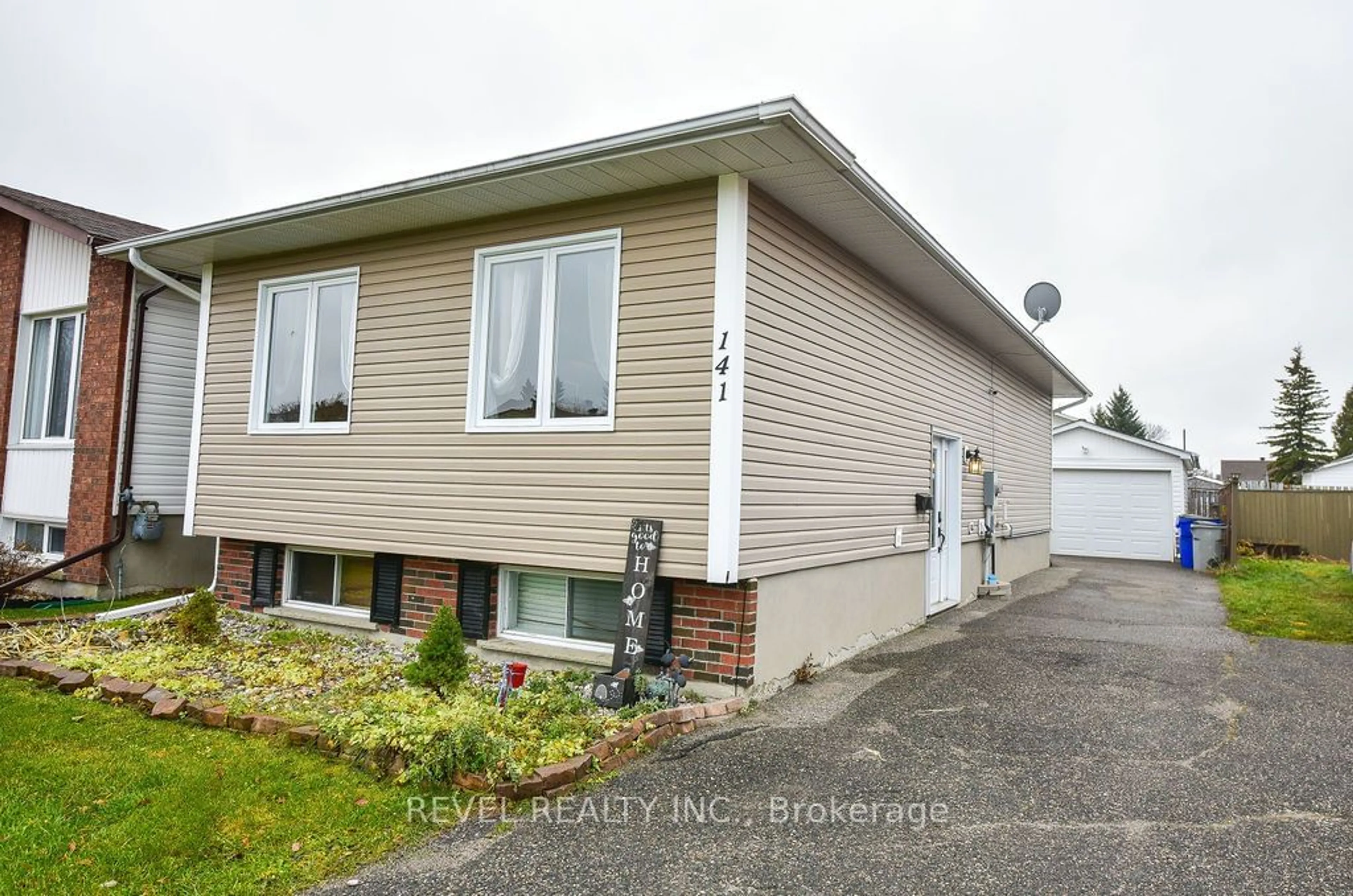 Frontside or backside of a home, the front or back of building for 141 Malette Cres, Timmins Ontario P4P 1C4