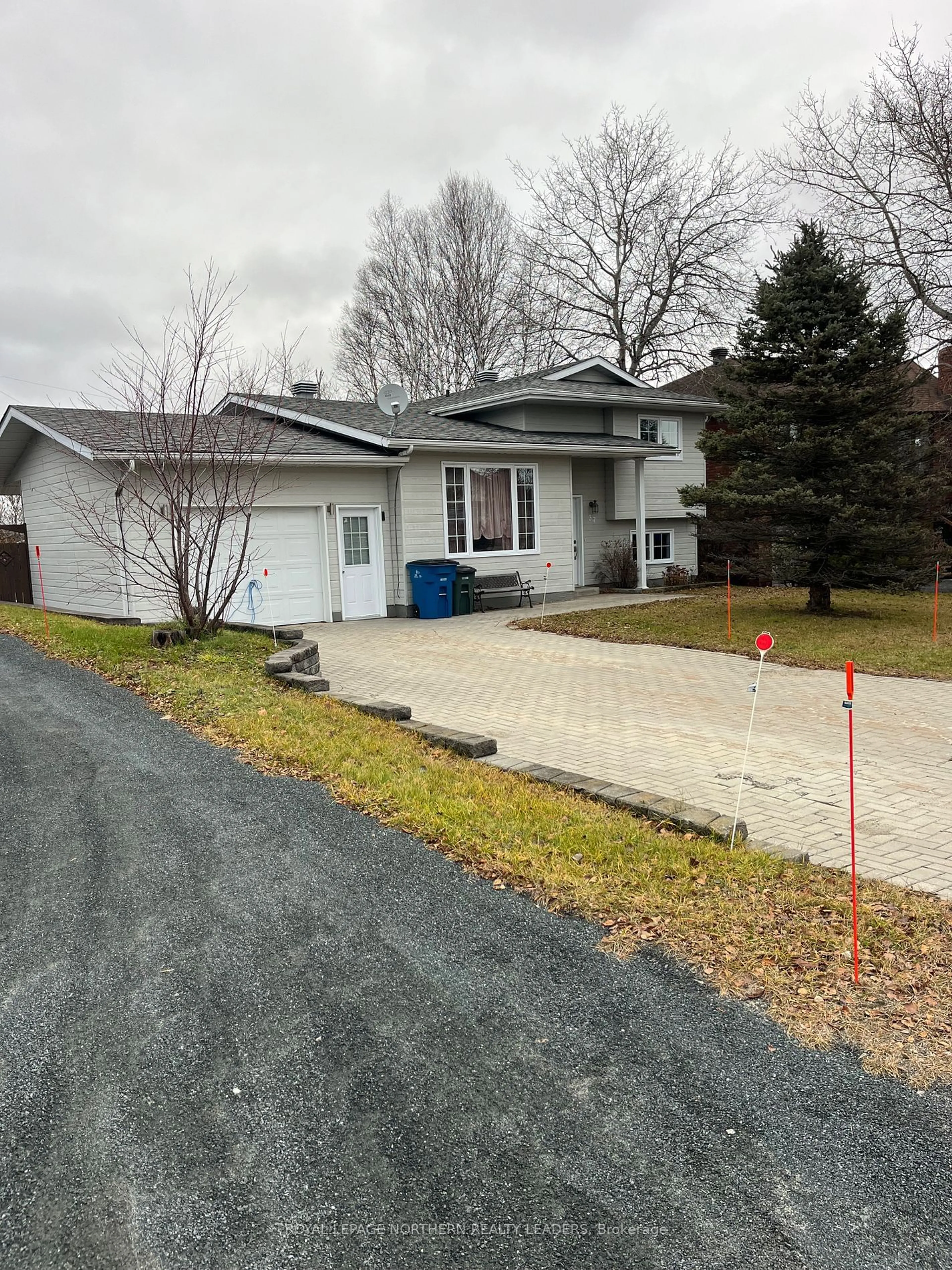 Frontside or backside of a home, the street view for 37 Algonquin Rd, Cochrane Ontario P0L 1C0