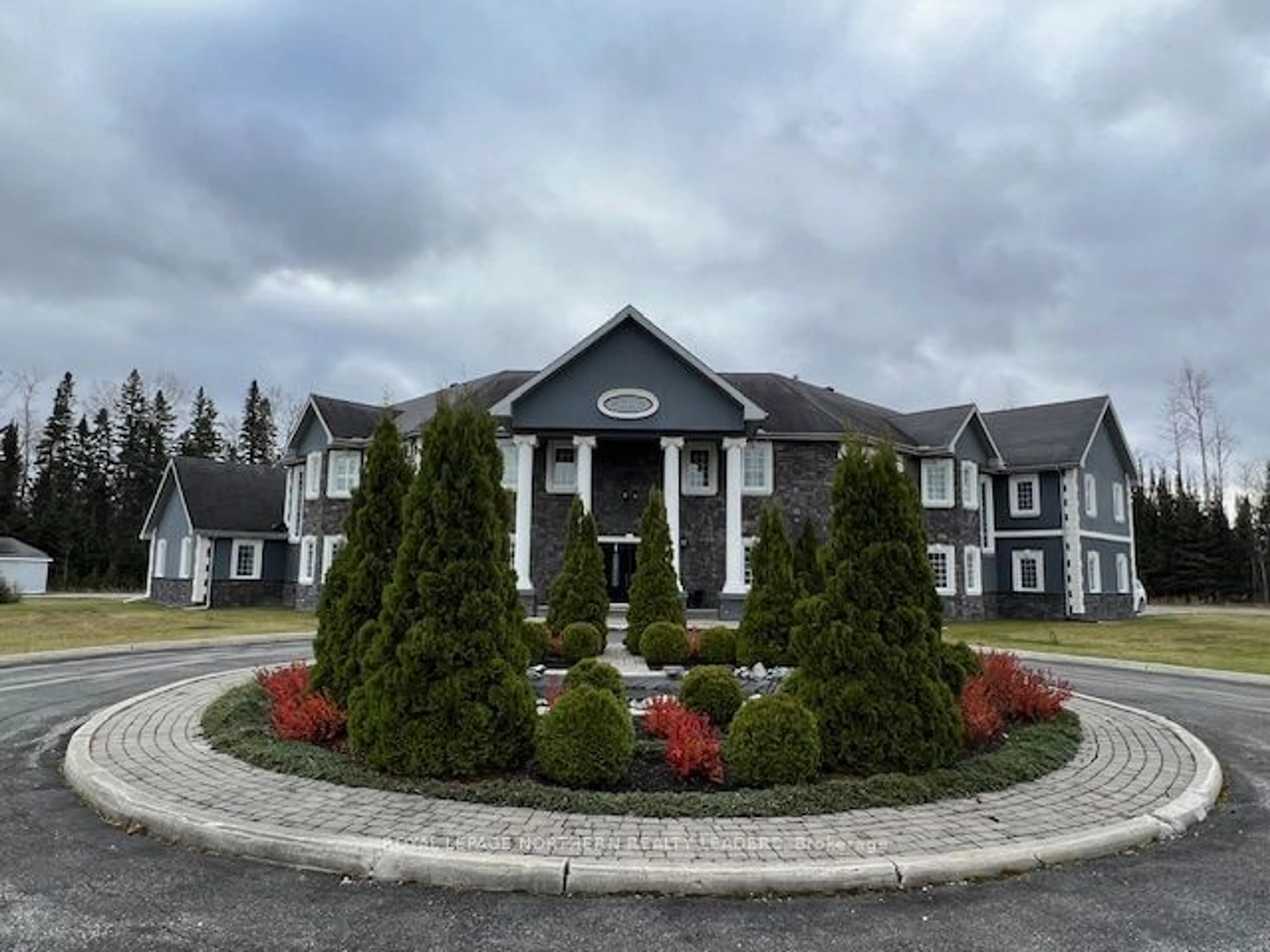 Frontside or backside of a home, the front or back of building for 1180 Government Rd, Timmins Ontario P4R 0J4