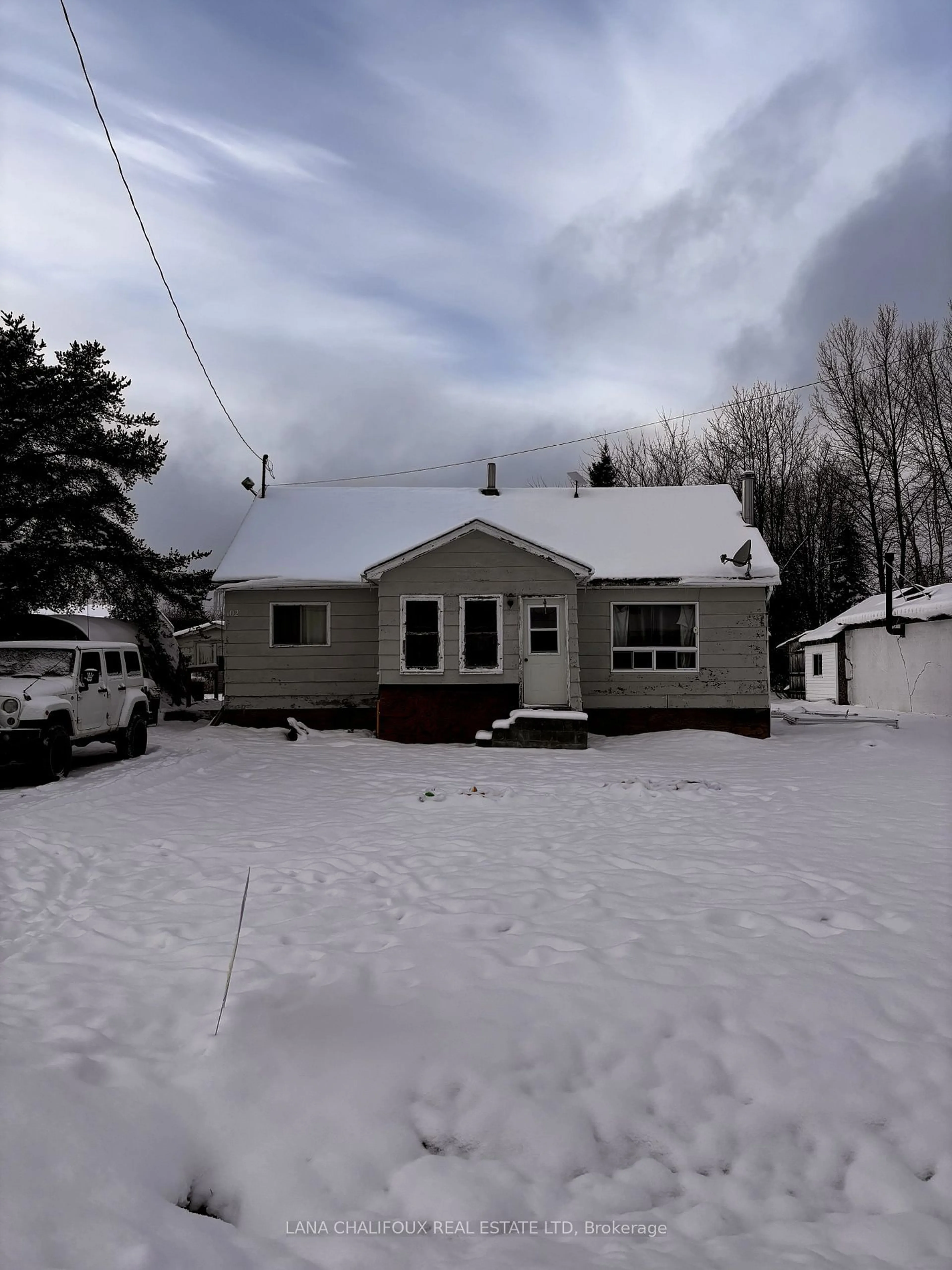 Frontside or backside of a home, cottage for 102 Thompson Blvd, Larder Lake Ontario P0K 1L0