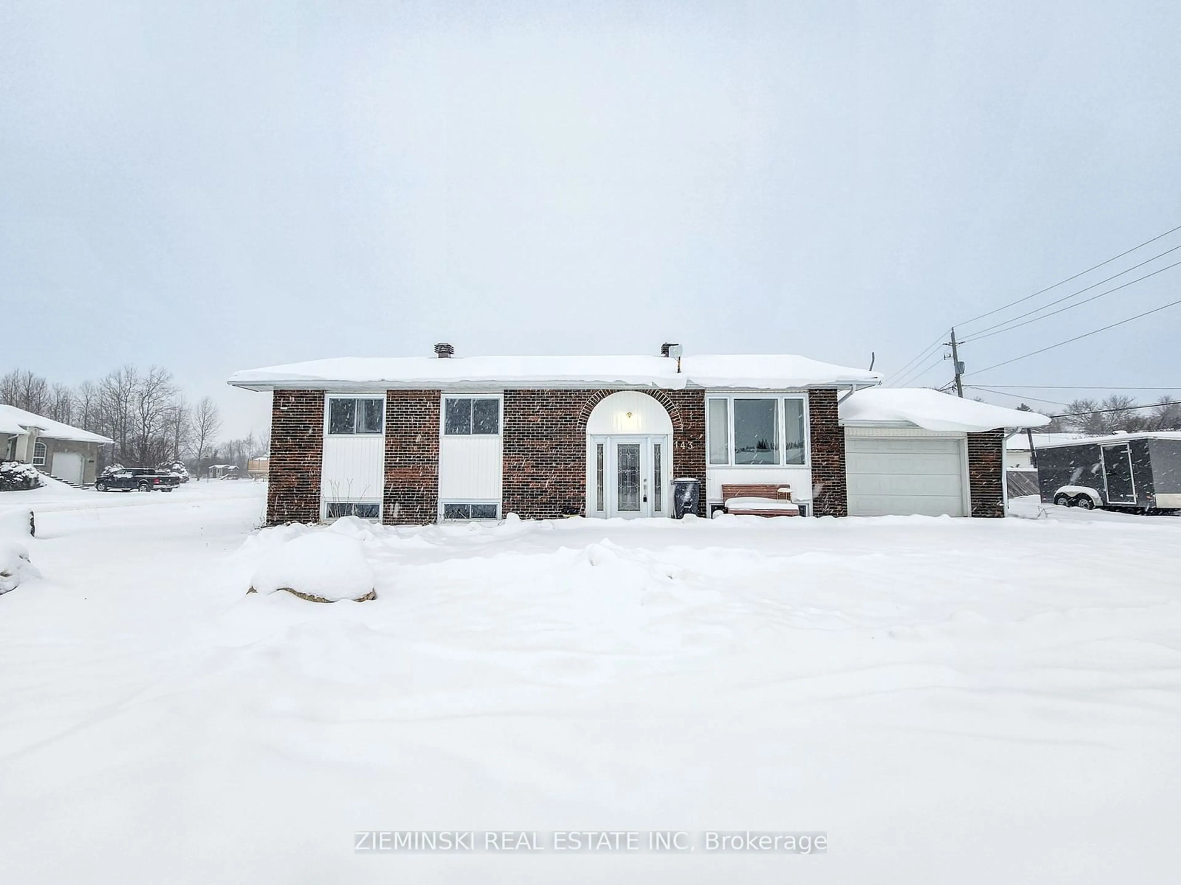 Frontside or backside of a home, the street view for 143 Tamarack St, Iroquois Falls Ontario P0K 1E0