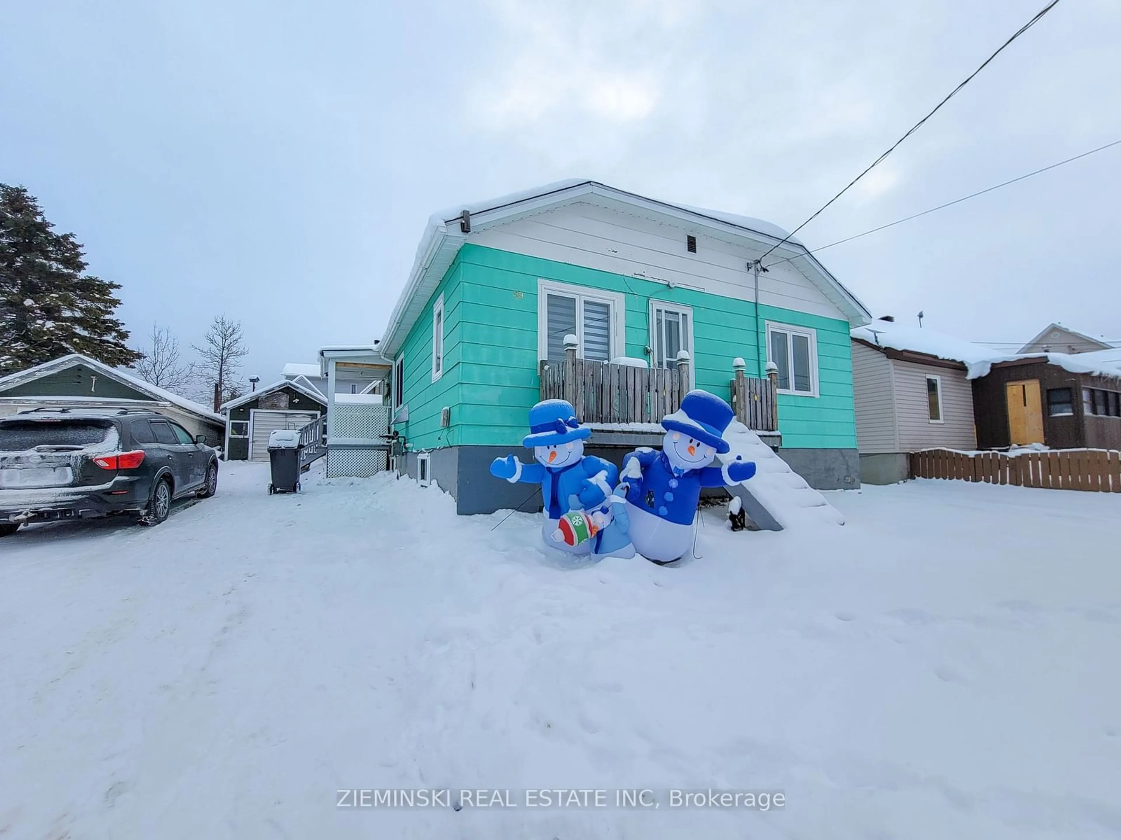 Frontside or backside of a home, the street view for 59 Marion St, Iroquois Falls Ontario P0K 1G0