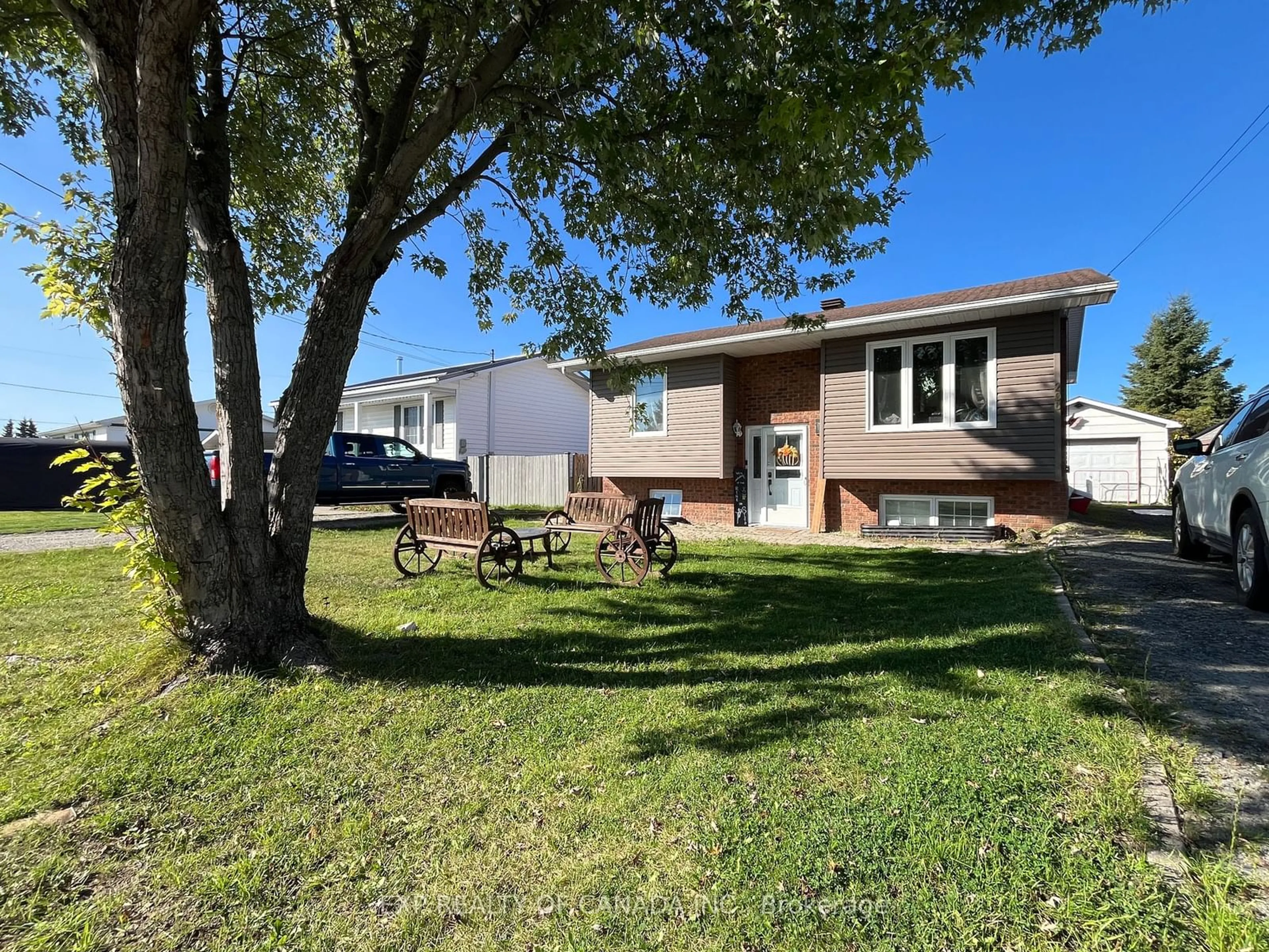 Frontside or backside of a home, the fenced backyard for 206 Ottolen St, Timmins Ontario P0N 1C0