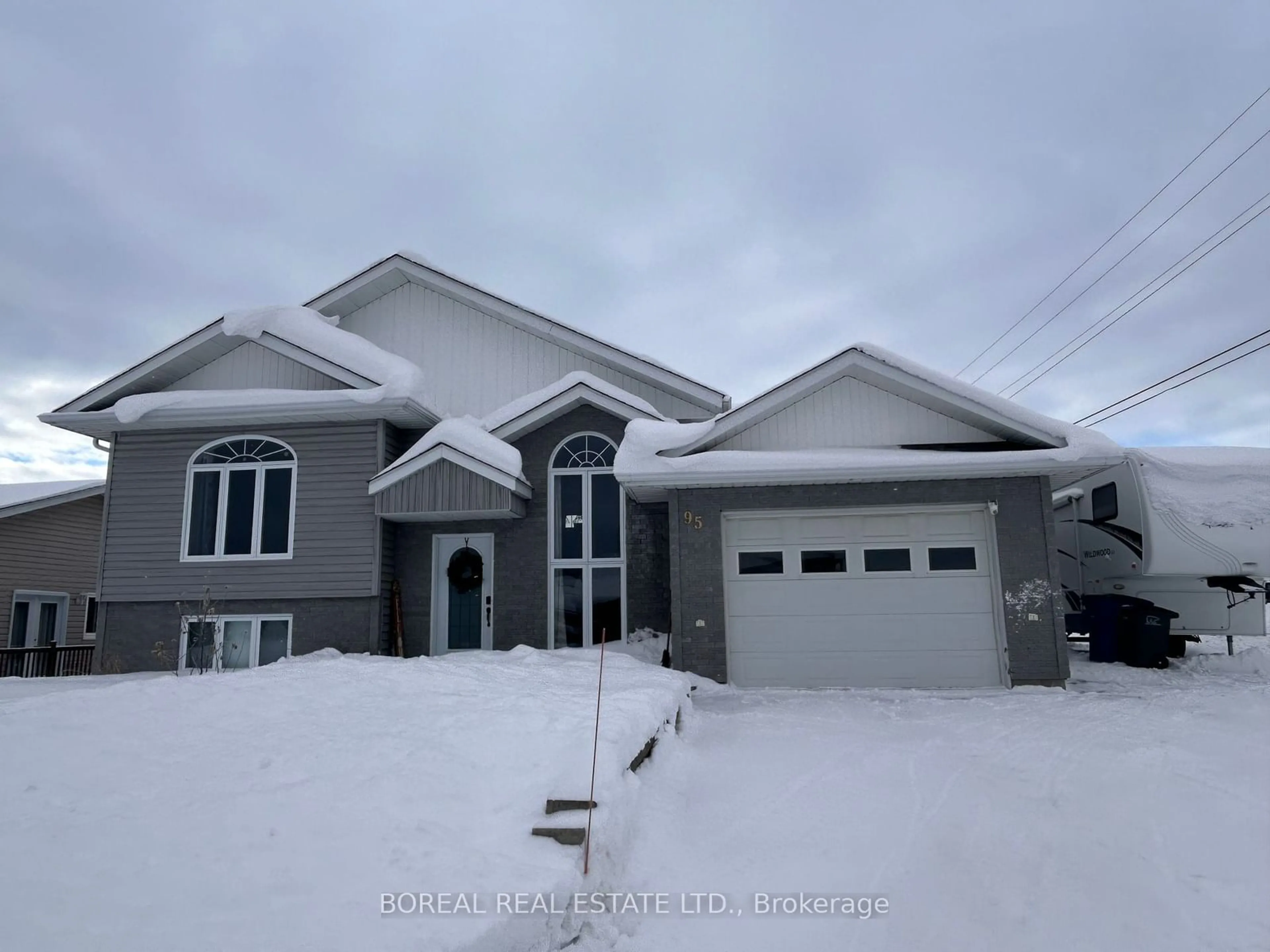 Home with vinyl exterior material, street for 95 Alexandra Ave, Cochrane Ontario P0L 1C0